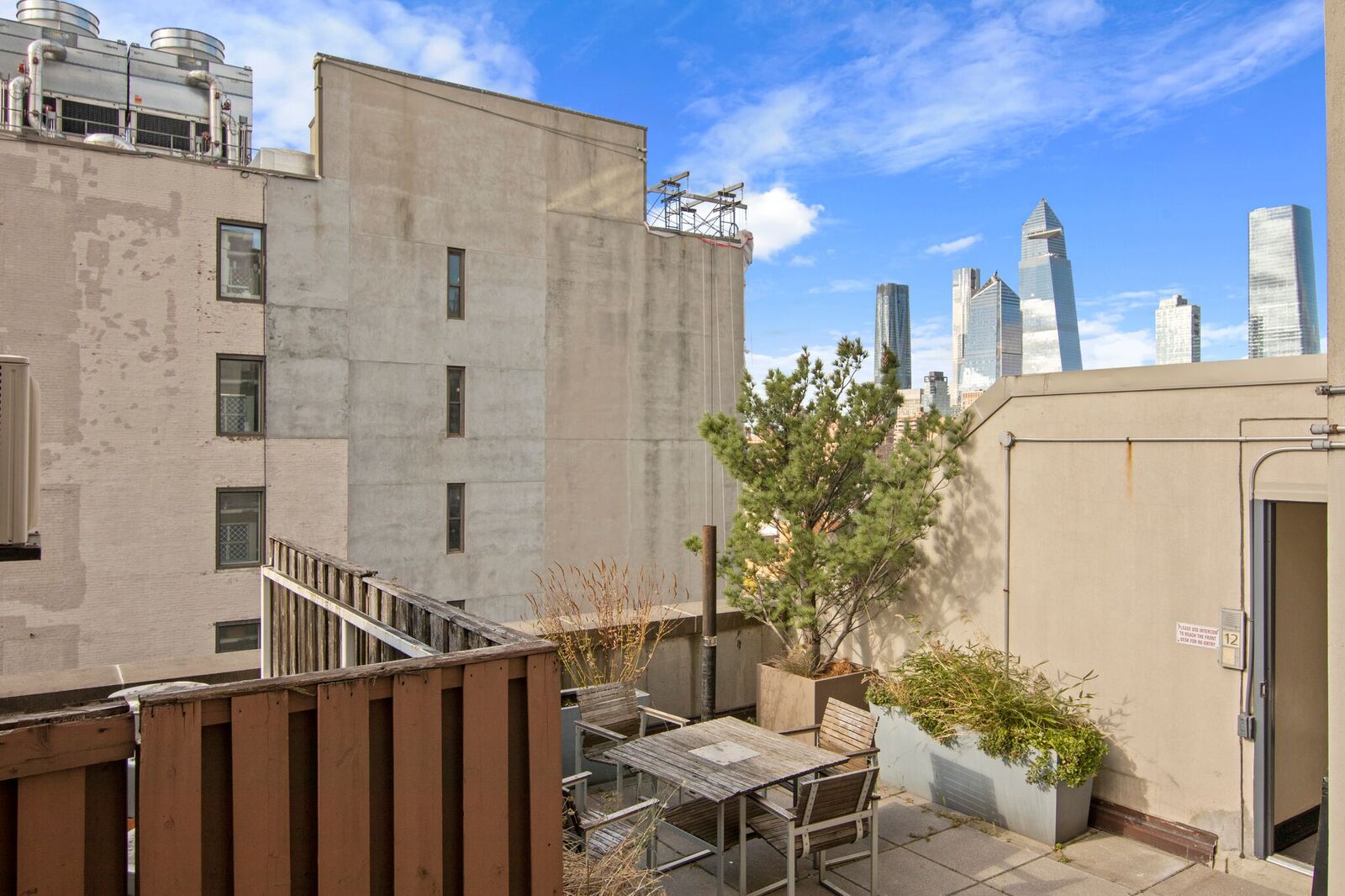 224 West 18th Street, Unit 6C Manhattan, NY 10011 - Photo 17 of 21 a view of a balcony with potted plants
