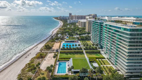 a view of a kitchen with a sink and wooden floor