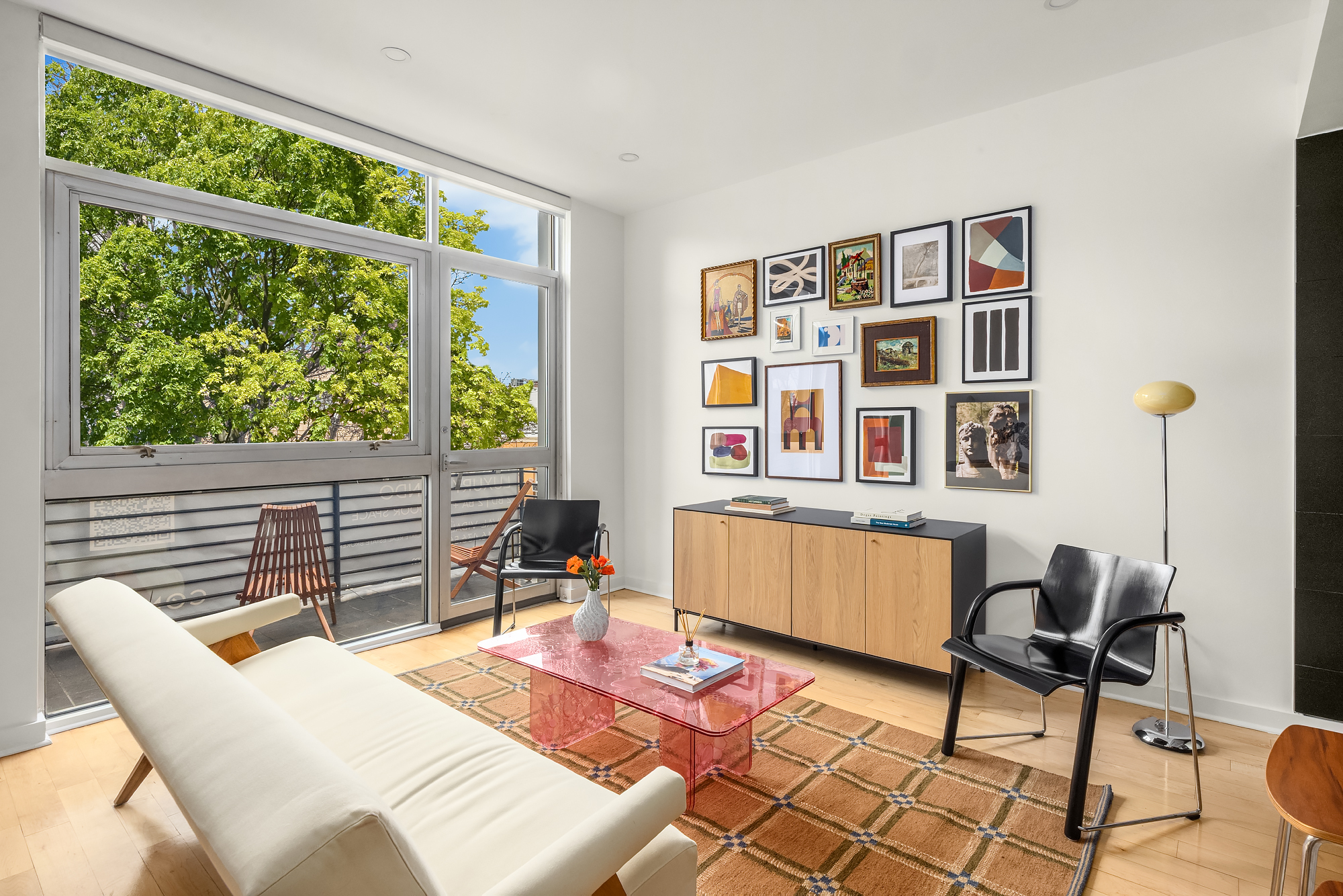 82 Guernsey Street, Unit 2A Brooklyn, NY 11222 - Photo 6 of 16 a living room with furniture and next to a window