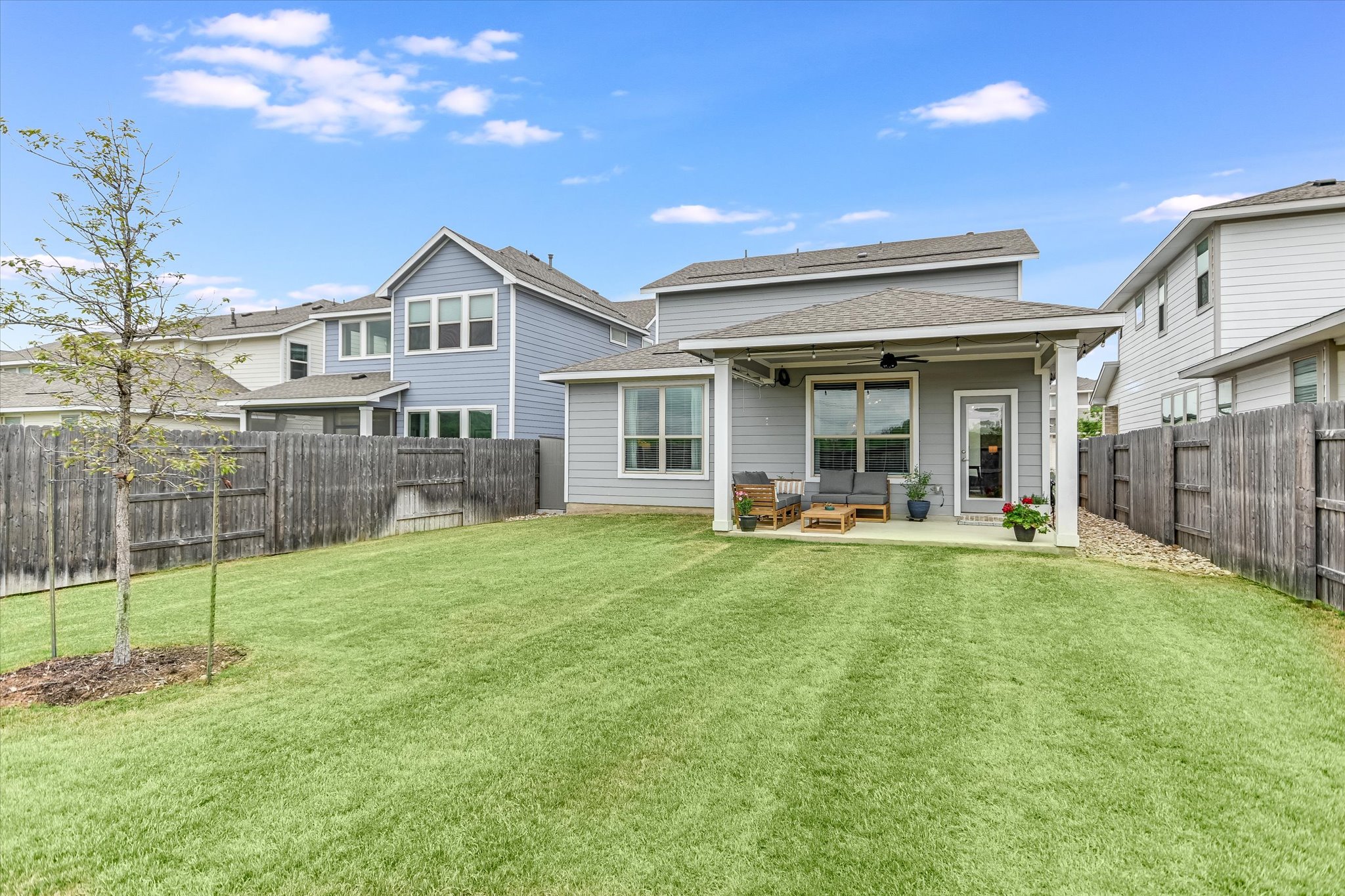 8607 McKamy Drive Austin, TX 78744 - Photo 24 of 28 a view of a house with swimming pool and porch