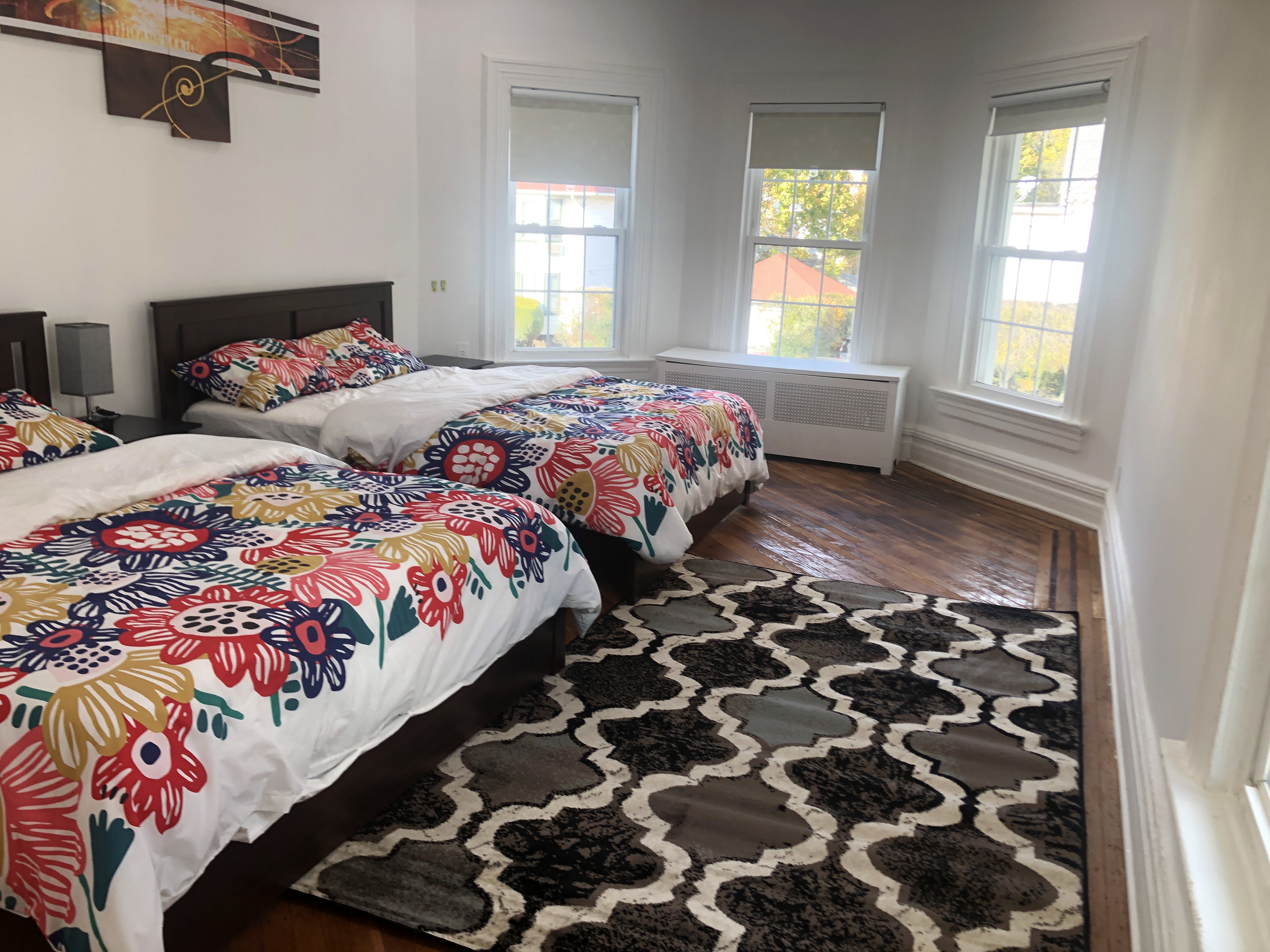 1112 Beverley Road Brooklyn, NY 11218 - Photo 3 of 53 a bedroom with two beds and a window