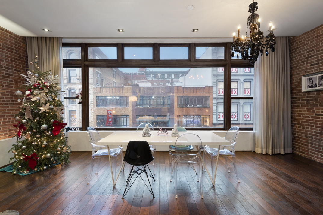405 Broadway, Unit 3 Manhattan, NY 10013 - Photo 5 of 11 a living room with furniture and a large window