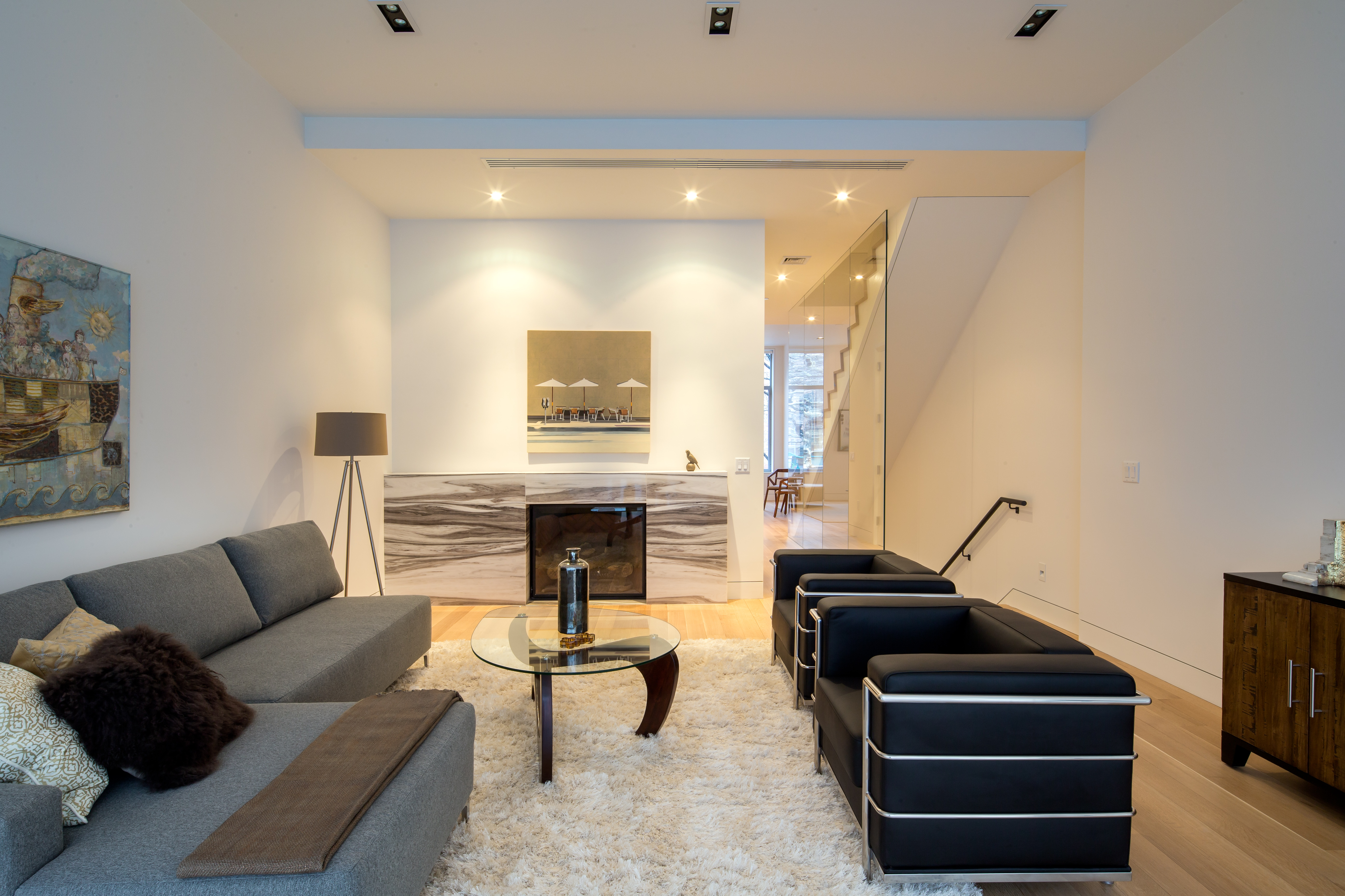 450 West 25th Street Manhattan, NY 10001 - Photo 8 of 16 a living room with furniture and a fireplace