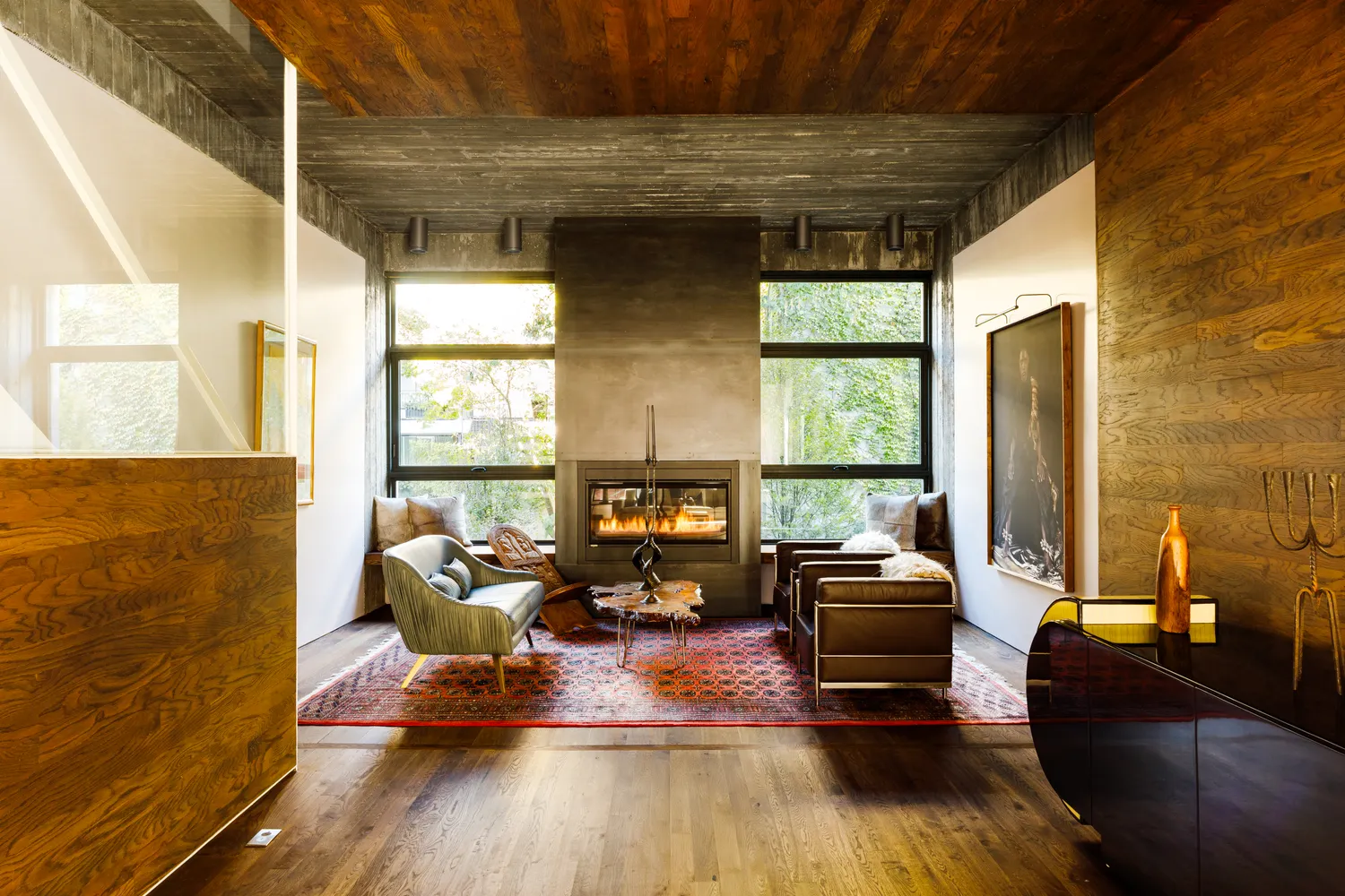 a living room with furniture window and wooden floor