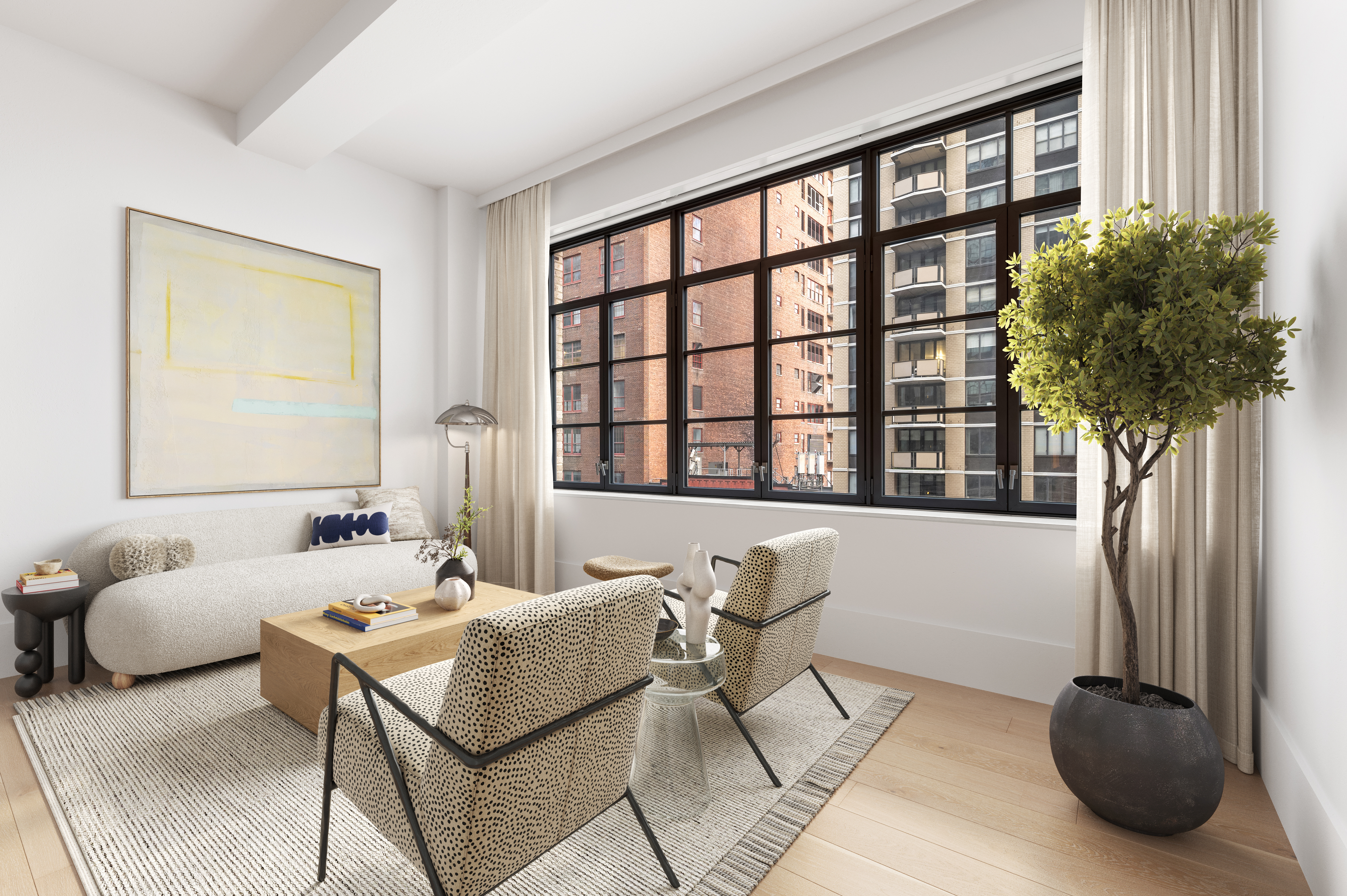 a living room with furniture and a potted plant