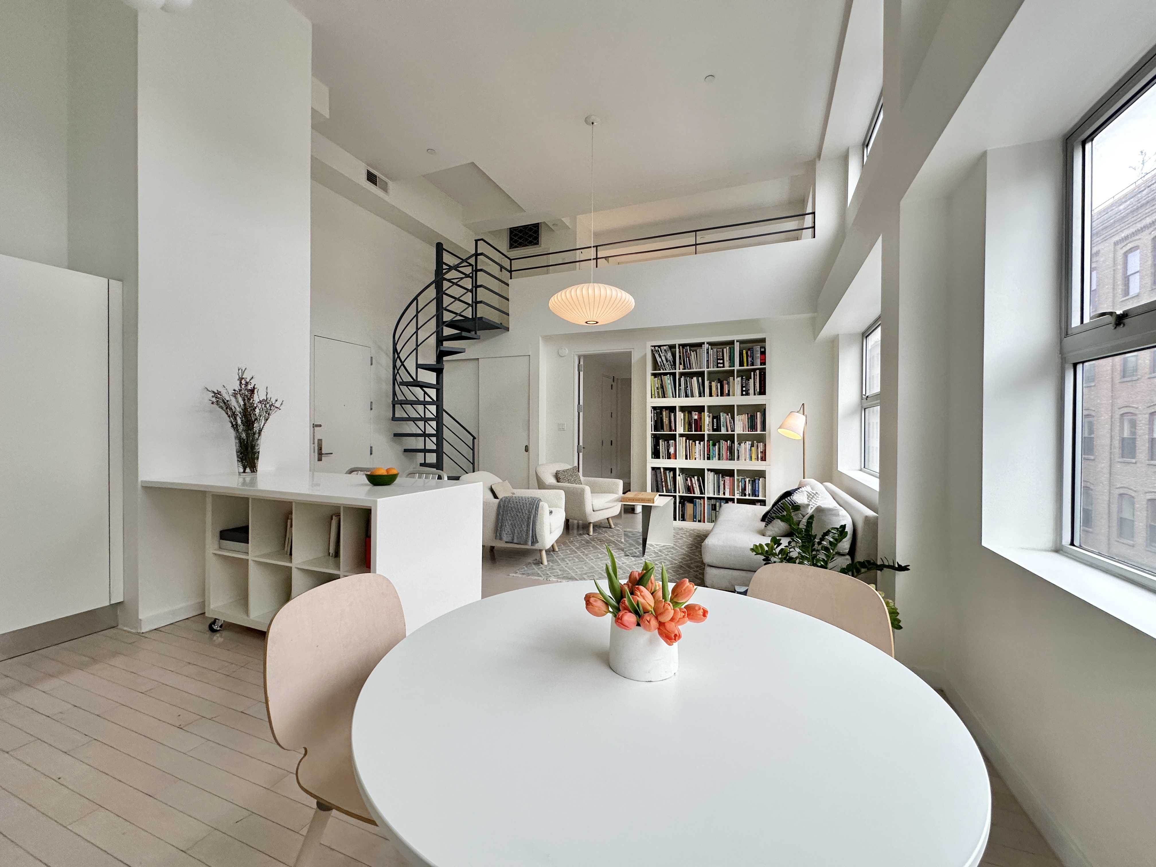 100 North 3rd Street, Unit 3E Brooklyn, NY 11249 - Photo 6 of 15 a living room with furniture and a table