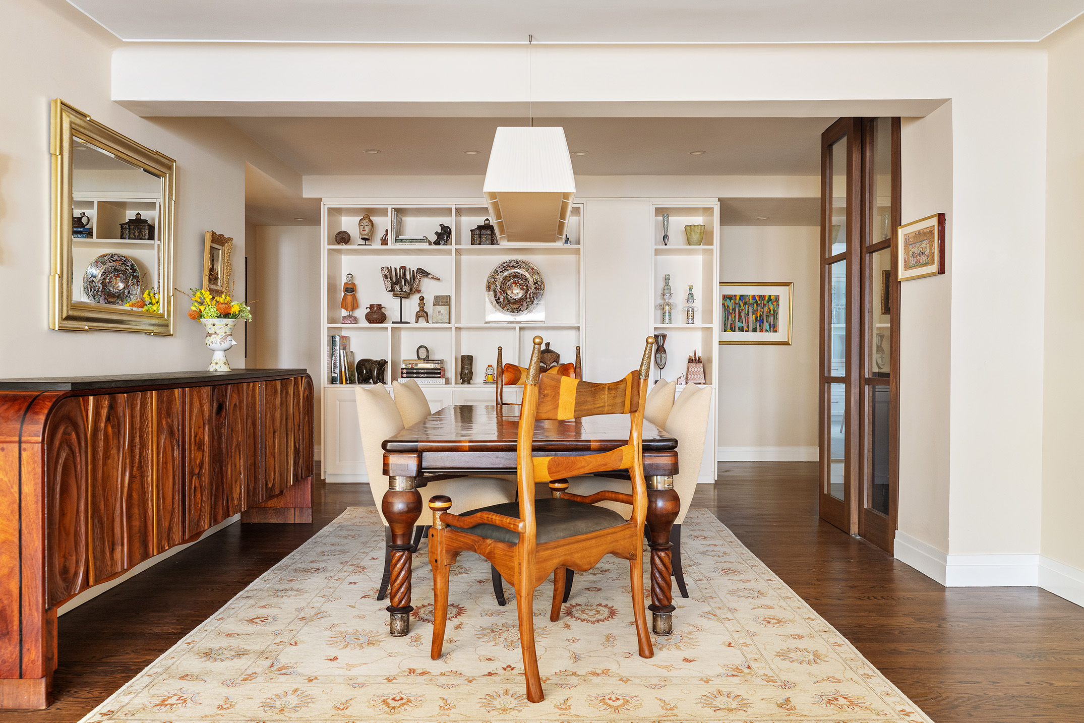 450 West End Avenue, Unit 3B Manhattan, NY 10024 - Photo 3 of 13 a dining room with furniture and wooden floor