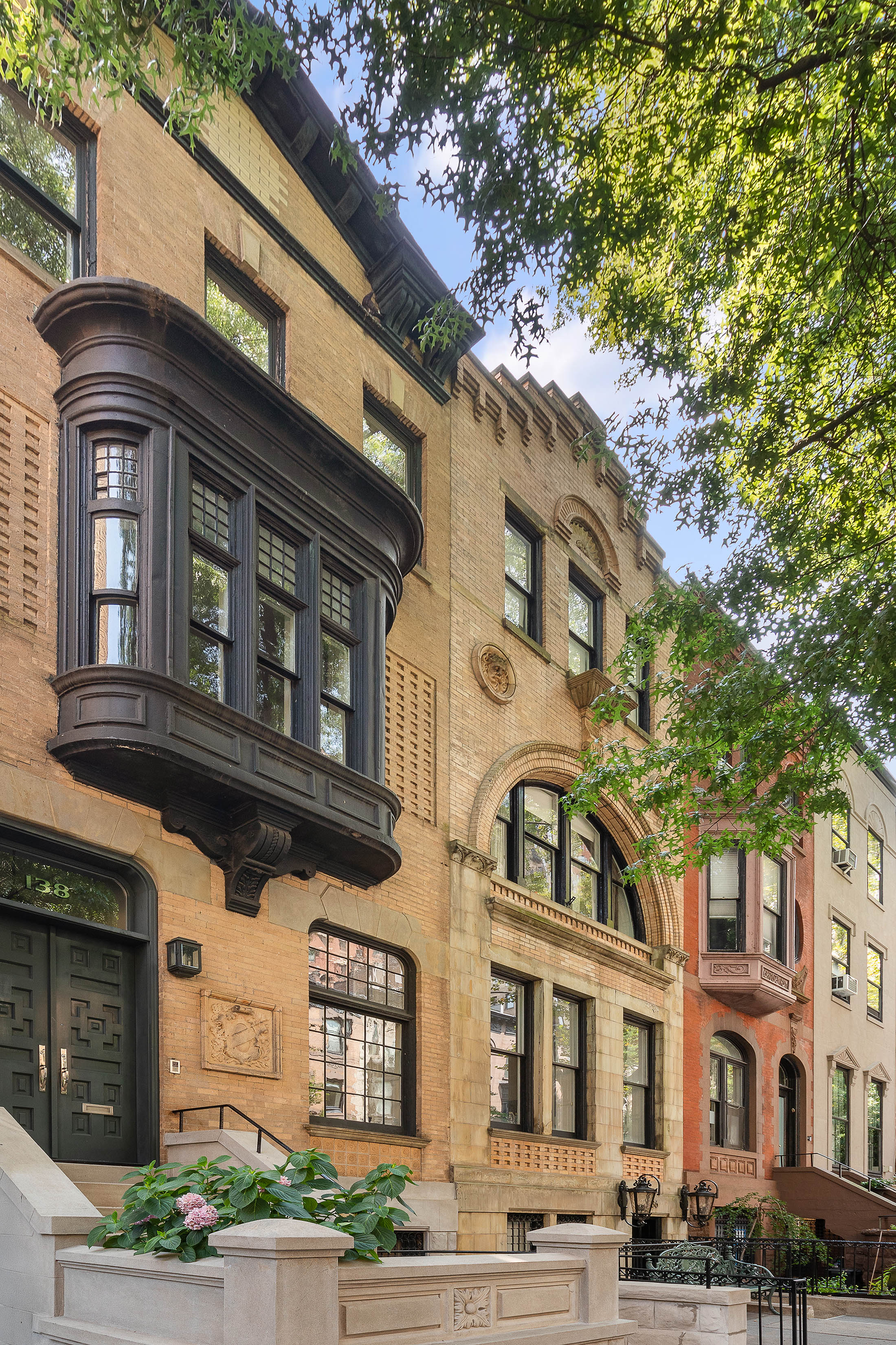 138 East 95th Street Manhattan, NY 10128 - Photo 2 of 2 a front view of a building