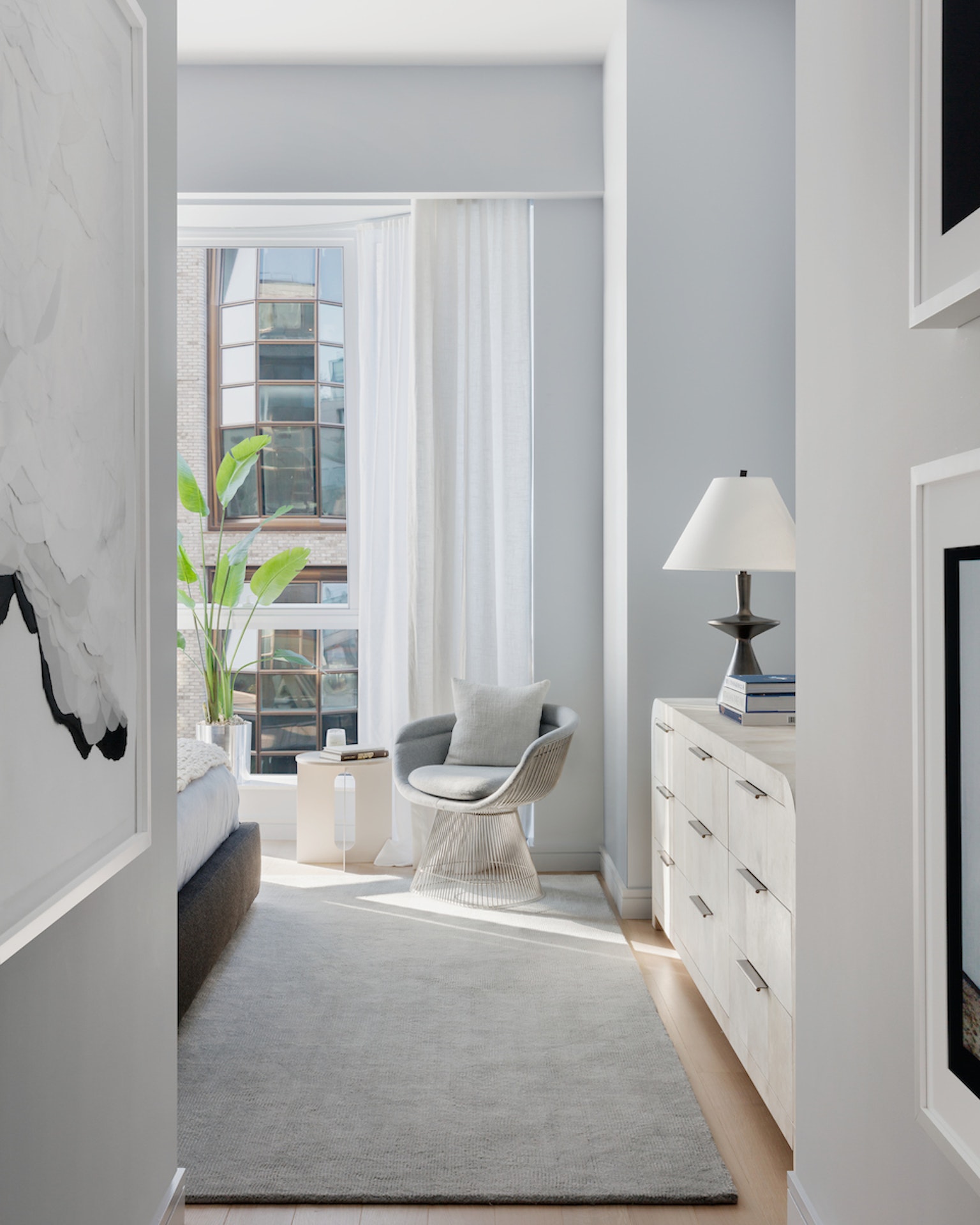 515 West 18th Street, Unit 805 Manhattan, NY 10011 - Photo 5 of 6 a spacious bedroom with a large bed and a window