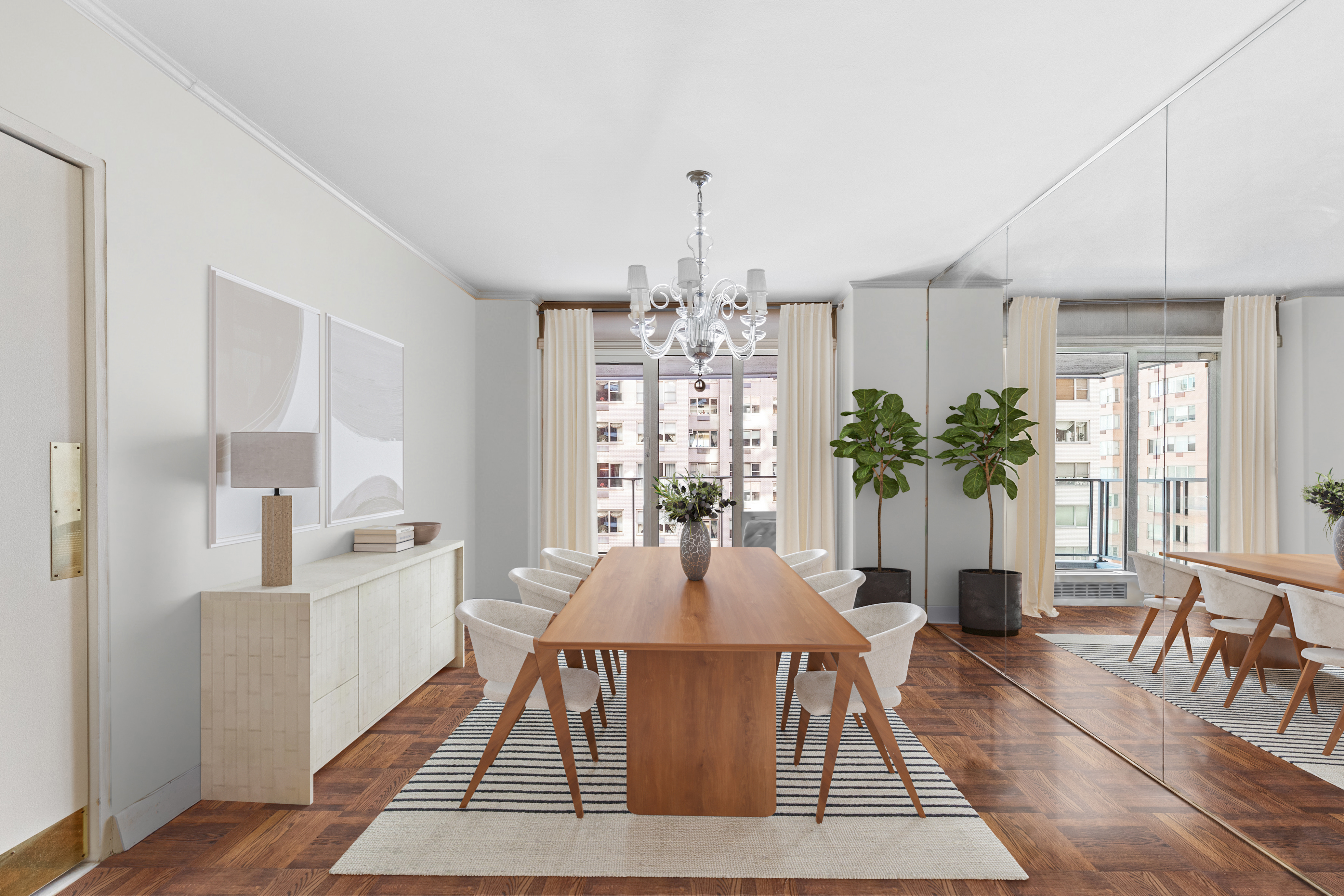 50 Sutton Place South, Unit 7A Manhattan, NY 10022 - Photo 6 of 16 a view of a dining room with furniture window and wooden floor