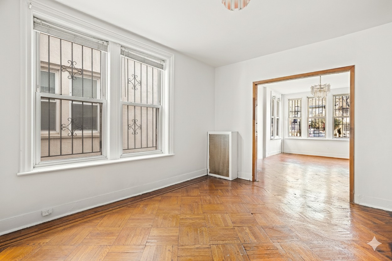 742 44th Street Brooklyn, NY 11220 - Photo 15 of 23 a view of an empty room with a window