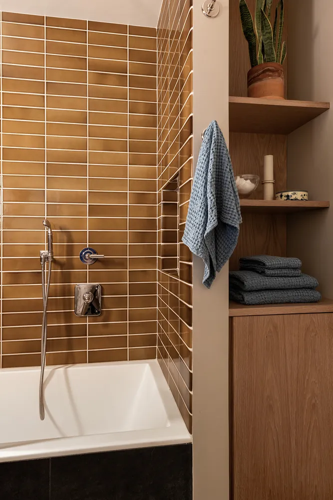 a bathroom with a sink and a shower