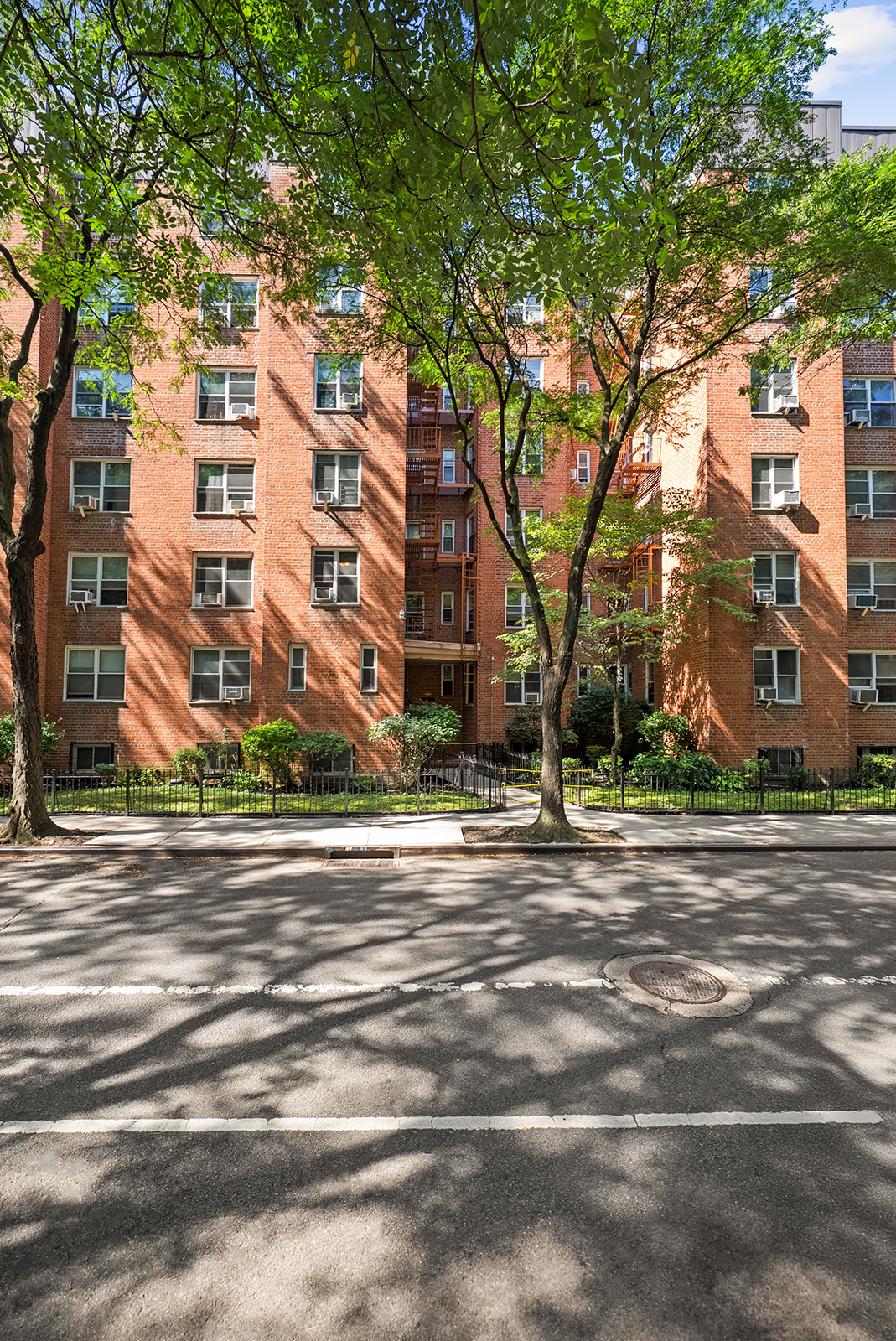 33-26 82nd Street, Unit 1H Queens, NY 11372 - Photo 10 of 11 front view of a building