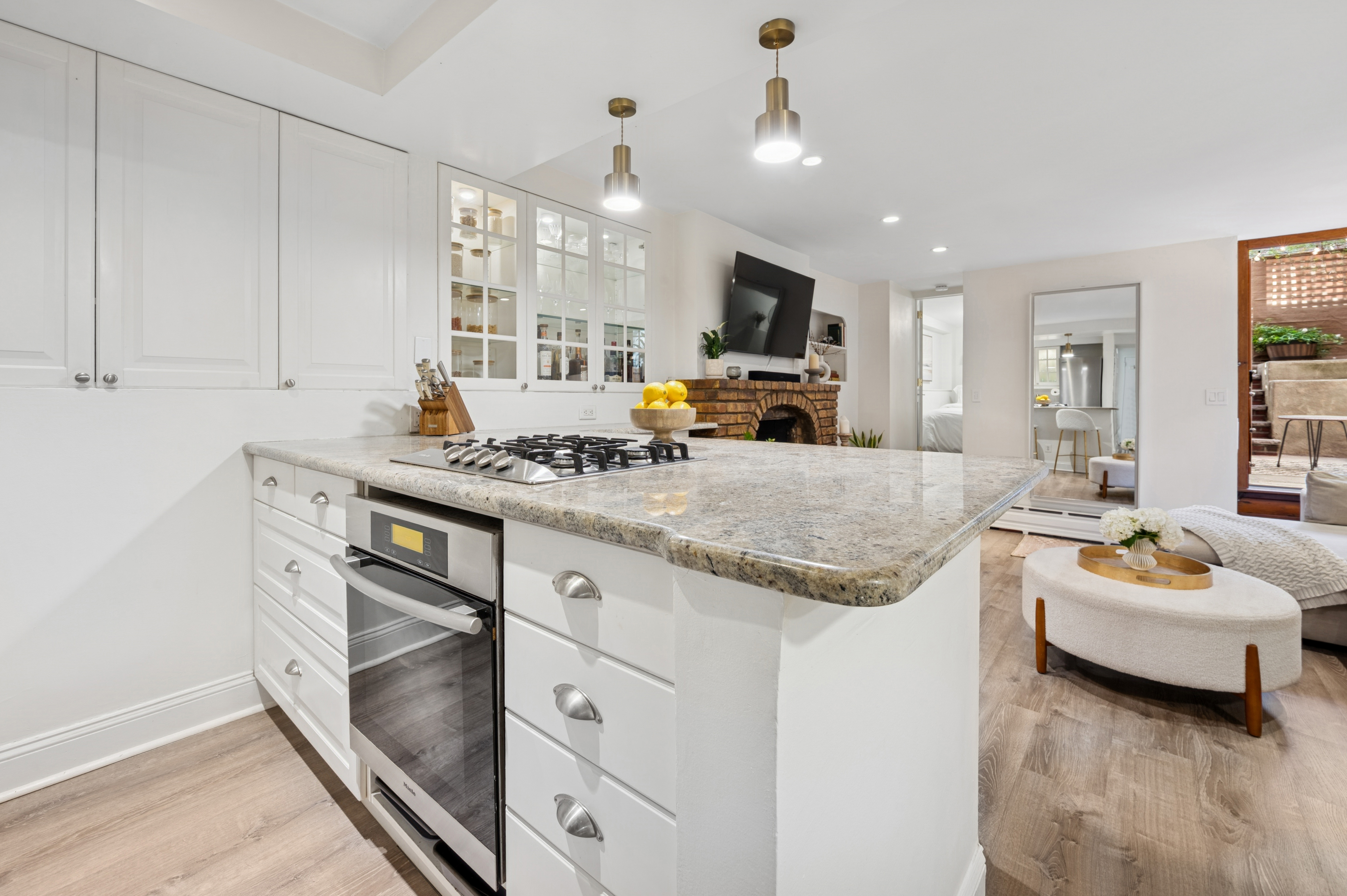 118 West 81st Street, Unit G Manhattan, NY 10024 - Photo 7 of 18 a kitchen with stainless steel appliances granite countertop a stove and a sink