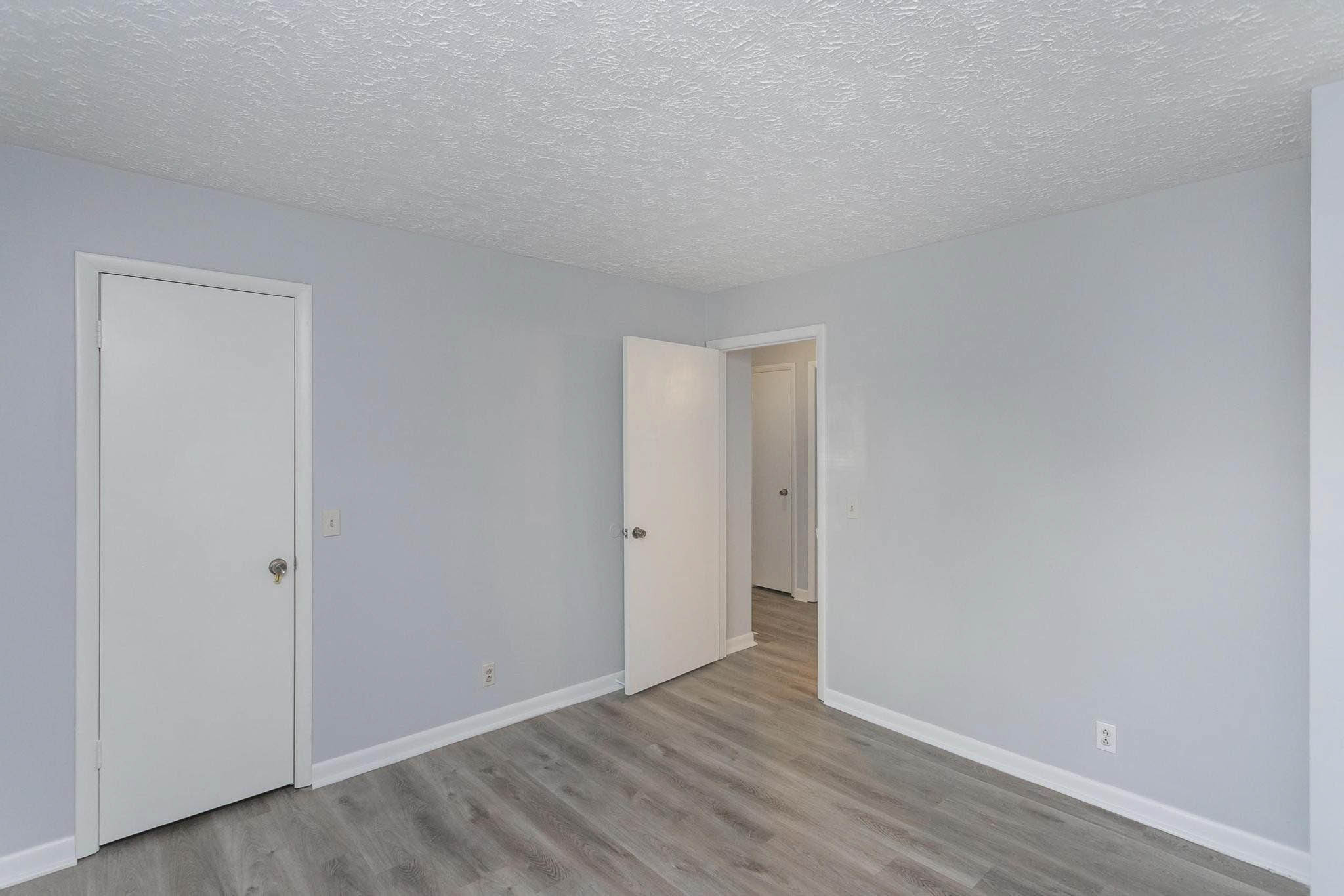 Falls Creek Drive, Unit 3307 & 3309 Nashville, TN 37214 - Photo 40 of 51 a view of an empty room with wooden floor and closet