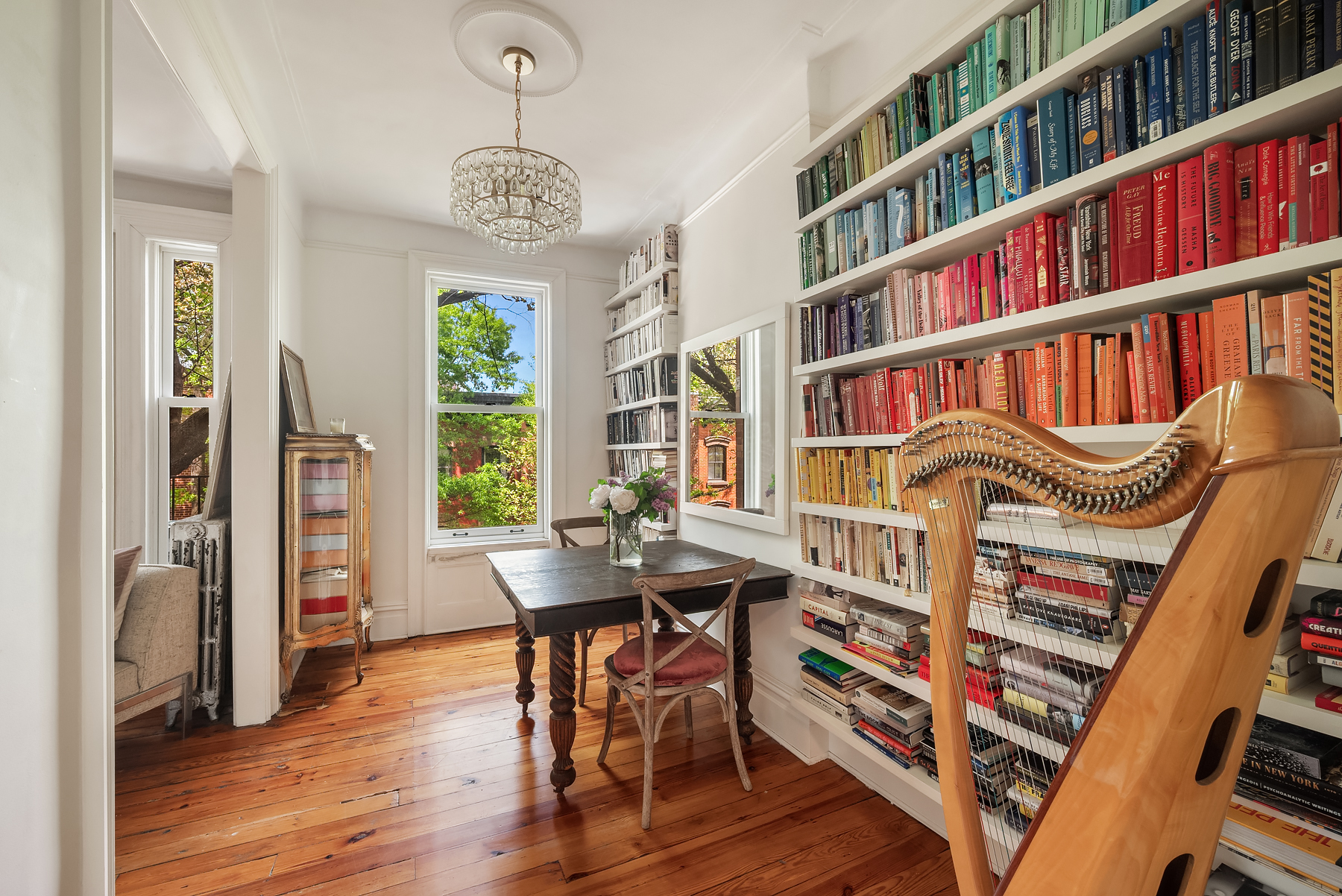 84 Charles Street, Unit 13 Manhattan, NY 10014 - Photo 4 of 8 a view of a dining room with furniture window and wooden floor