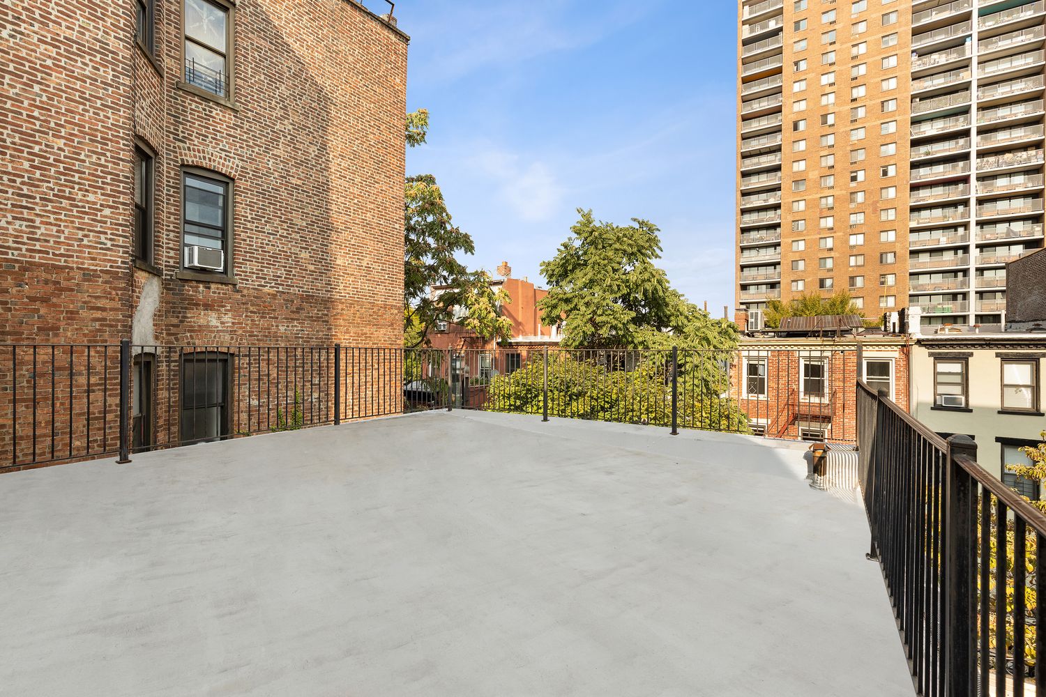 315 Washington Avenue Brooklyn, NY 11205 - Photo 26 of 38 a view of a house with backyard and parking