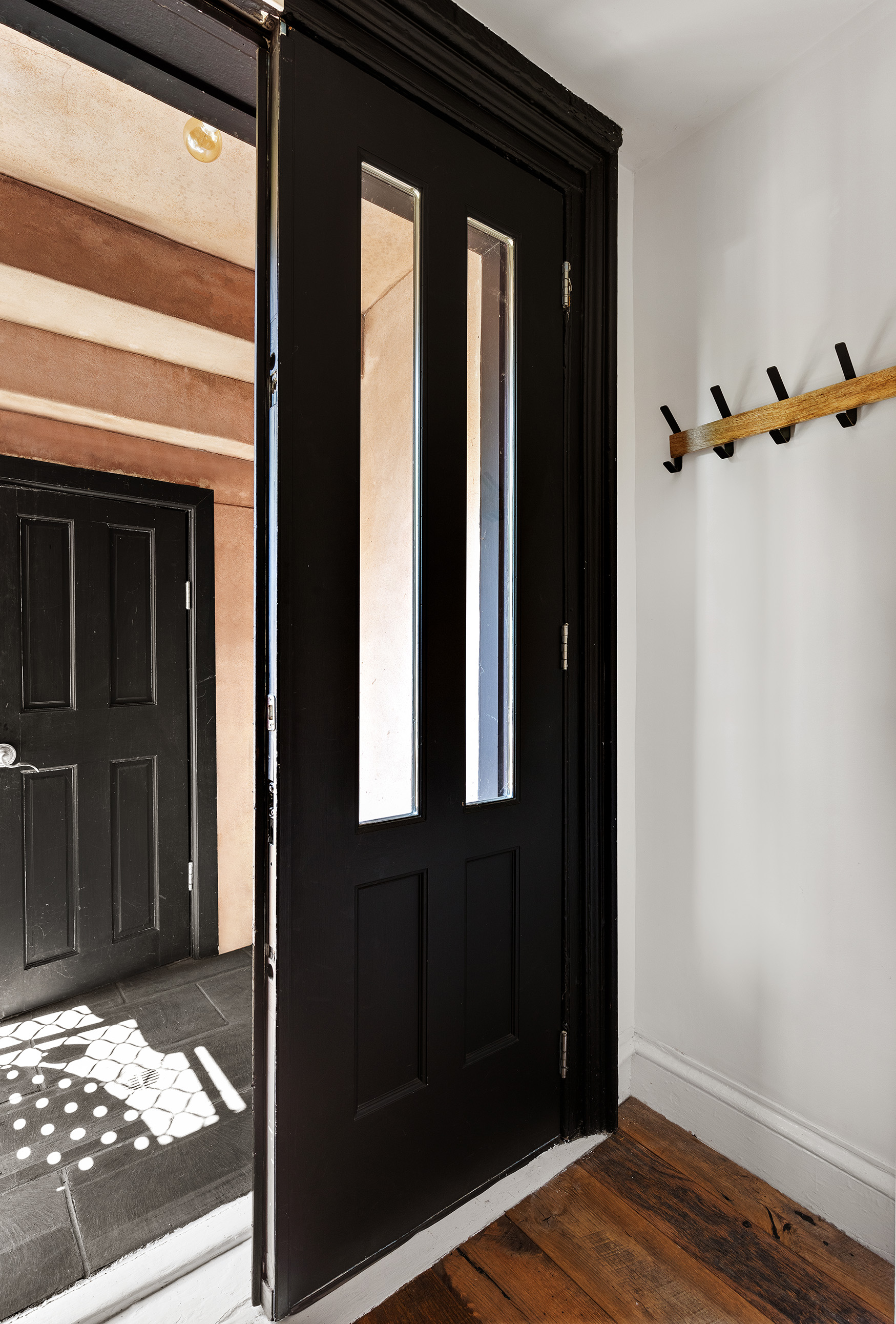 121 St James Place, Unit GARDEN Brooklyn, NY 11238 - Photo 6 of 8 a view of a door and a window