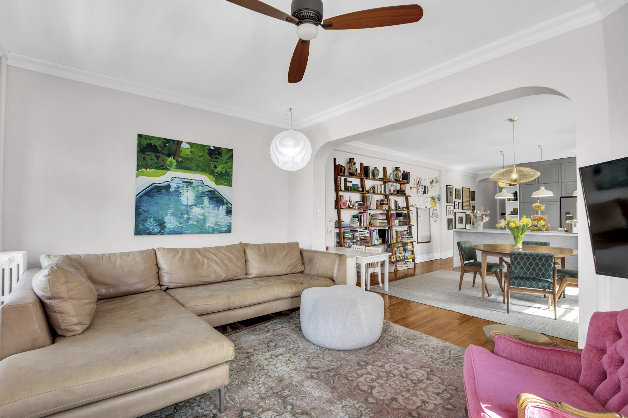 275 Clinton Avenue, Unit 4-1 Brooklyn, NY 11205 - Photo 3 of 20 a living room with furniture a rug and a window