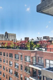 a view of a city with tall buildings