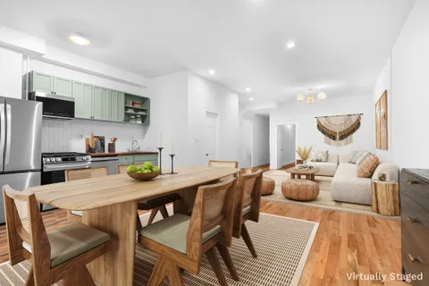 a view of a kitchen with microwave and cabinets