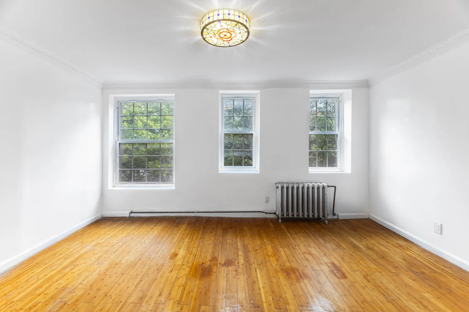 an empty room with window