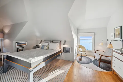 a view of a balcony with lake view and a ocean view