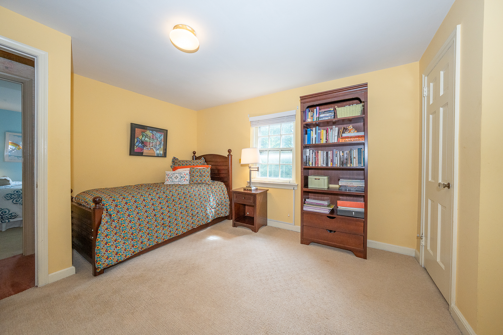 519 Mercer Road Merion Station, PA 19066 - Photo 34 of 58 a bedroom with furniture and a lamp