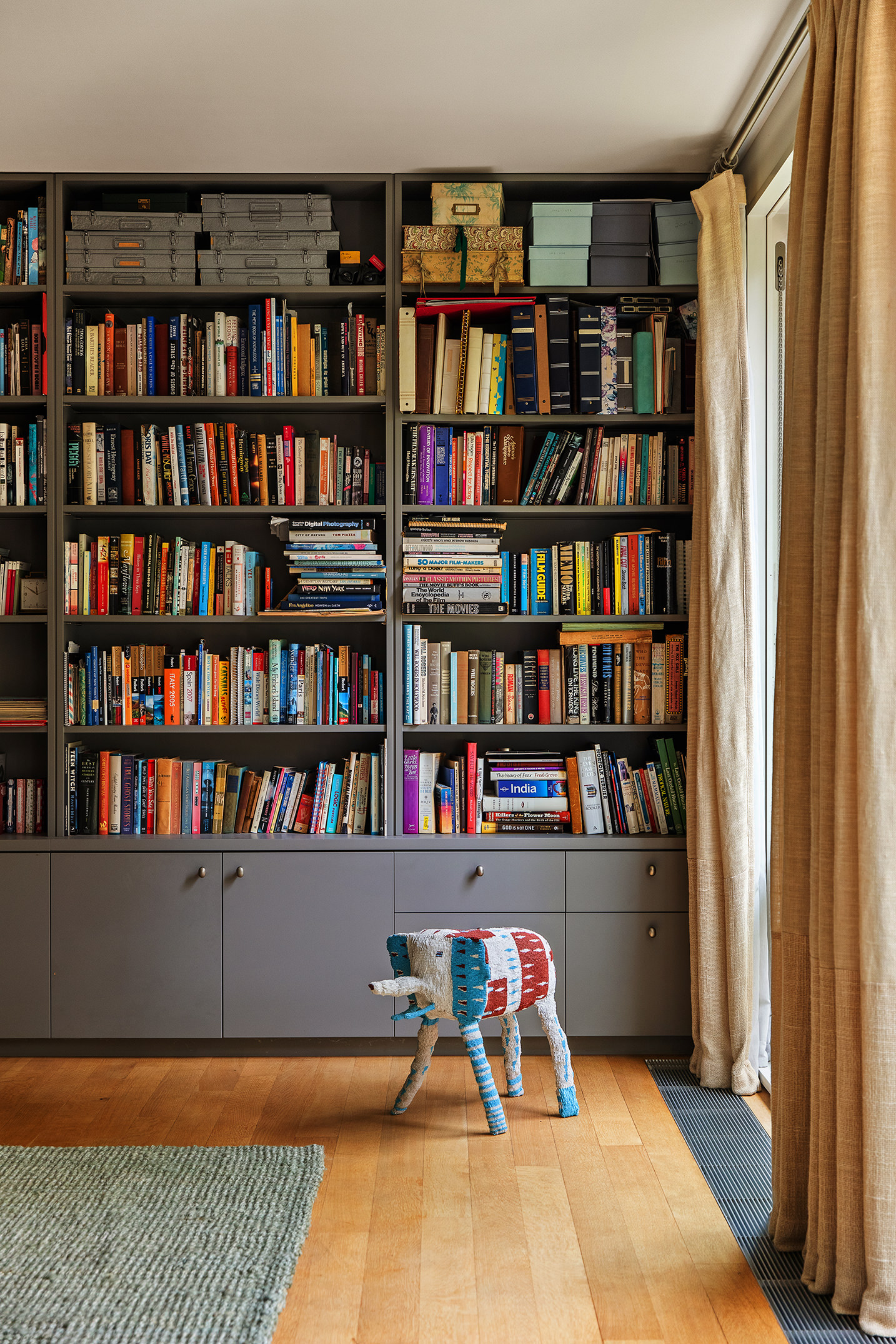 12 Sidney Place Brooklyn, NY 11201 - Photo 23 of 36 a view of a workspace with bookshelf and a window