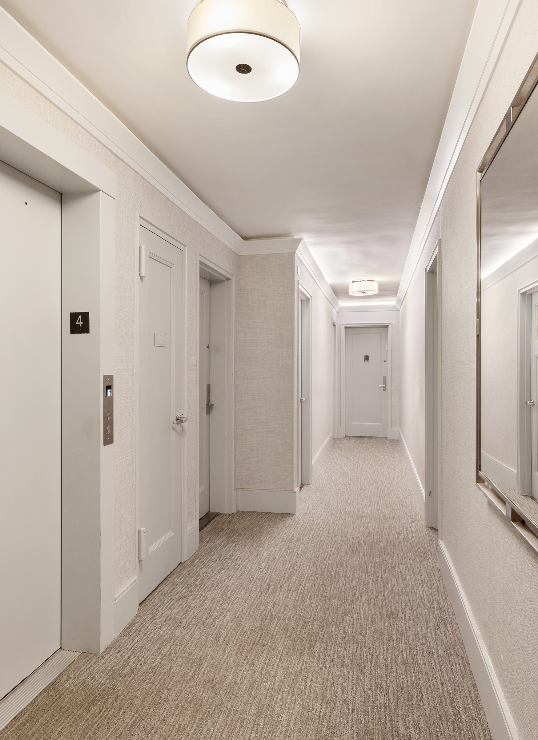 81 Bedford Street, Unit 4B Manhattan, NY 10014 - Photo 12 of 15 a view of a hallway with wooden floor