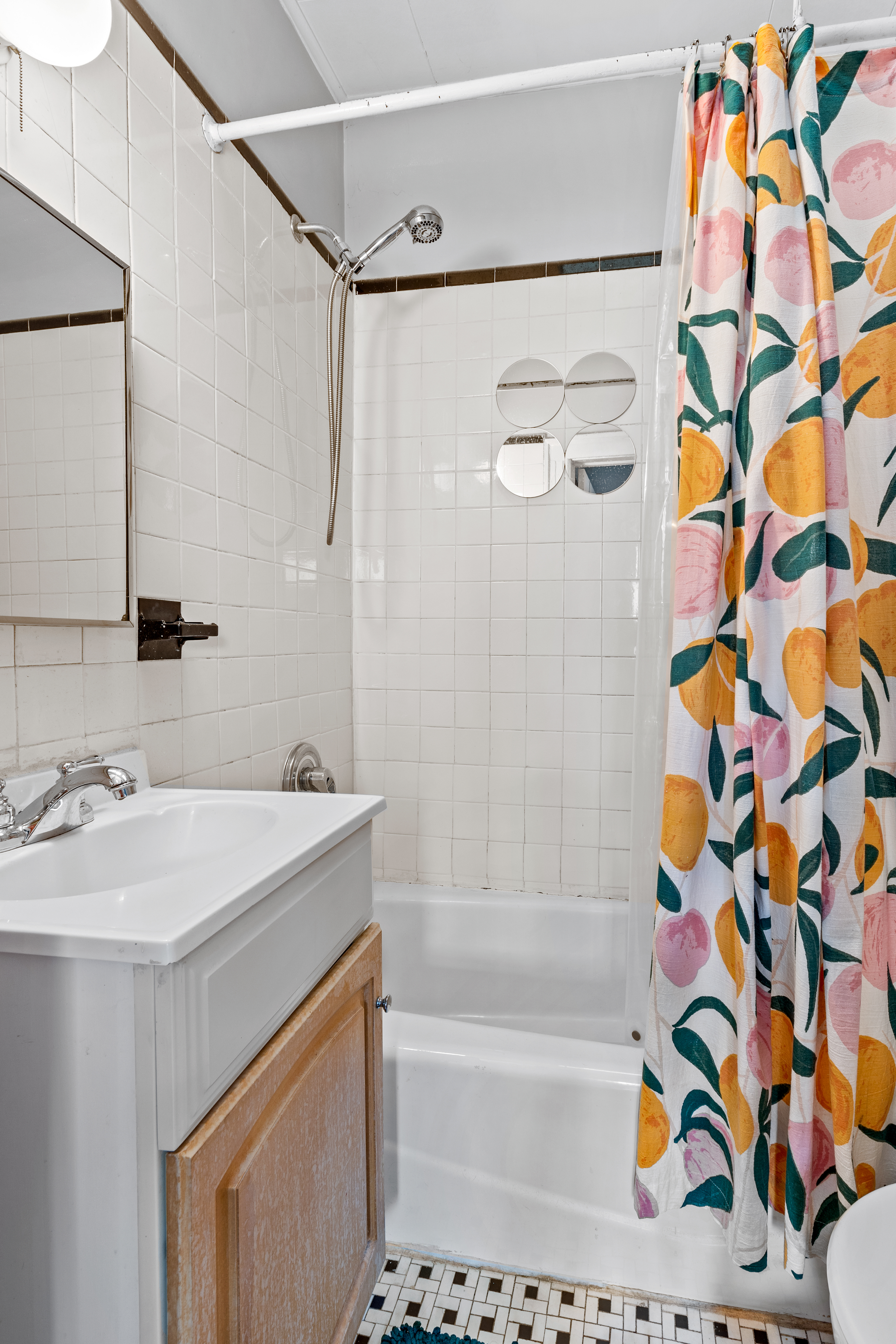 546 Prospect Avenue, Unit 2F Brooklyn, NY 11215 - Photo 4 of 4 a bathroom with a sink a bath tub and a shower curtain