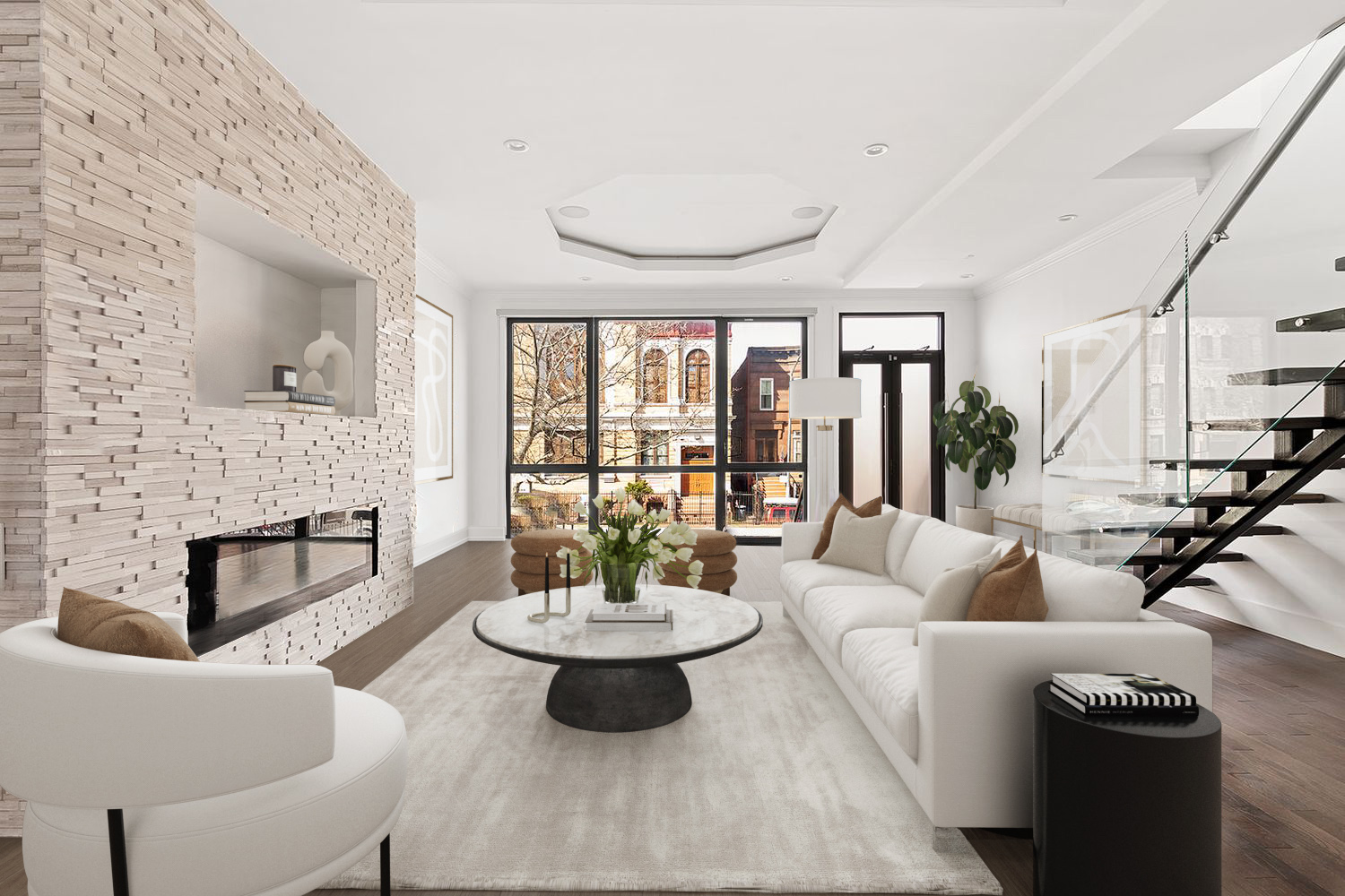 a living room with fireplace furniture and a large window