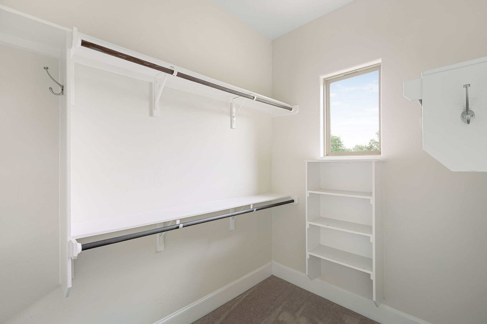 812 Jennings Branch Georgetown, TX 78633 - Photo 48 of 100 a view of walk in closet with empty racks
