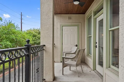 a view of a balcony with chair