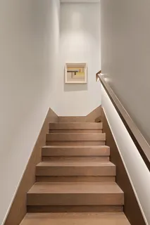 a view of a patio with a table and chairs