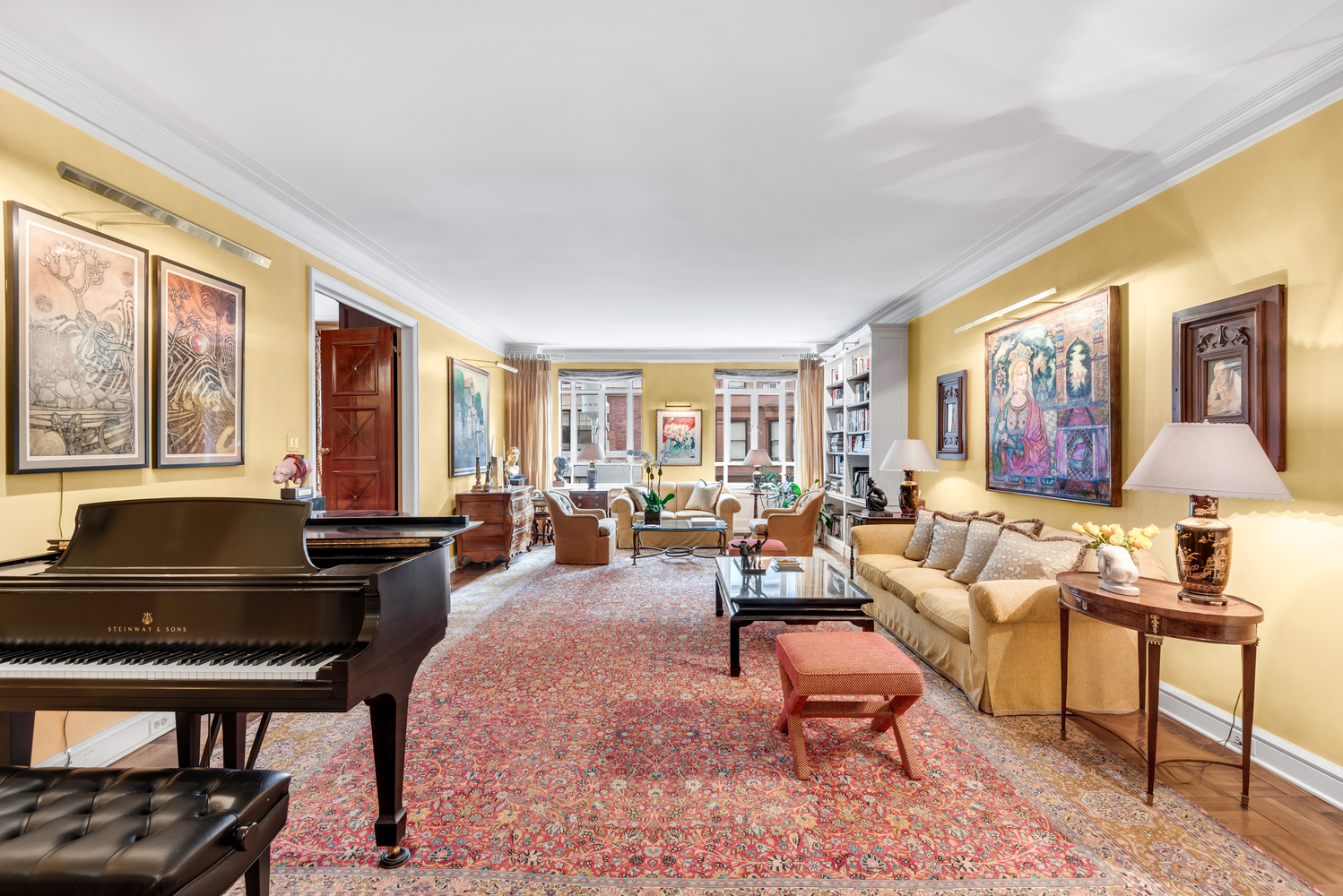 115 Central Park West, Unit 3B Manhattan, NY 10023 - Photo 2 of 20 a living room with furniture and a lamp