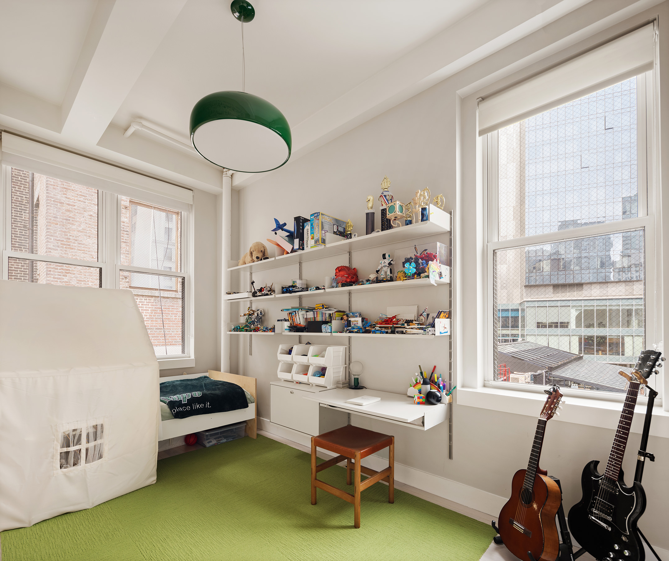 24 West 30th Street, Unit 7 Manhattan, NY 10001 - Photo 11 of 13 a room with furniture and a window