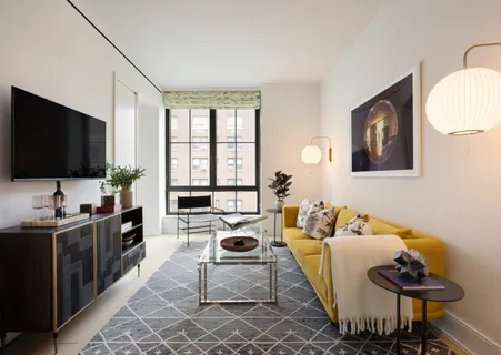 a view of a bathroom with a sink and a mirror