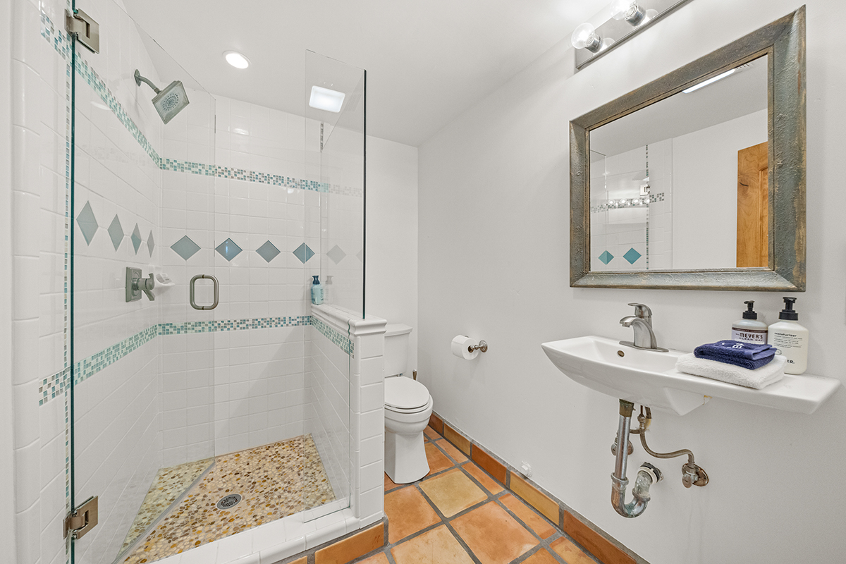 161 Loureyro Road Montecito, CA 93108 - Photo 24 of 52 a bathroom with a sink a toilet and shower