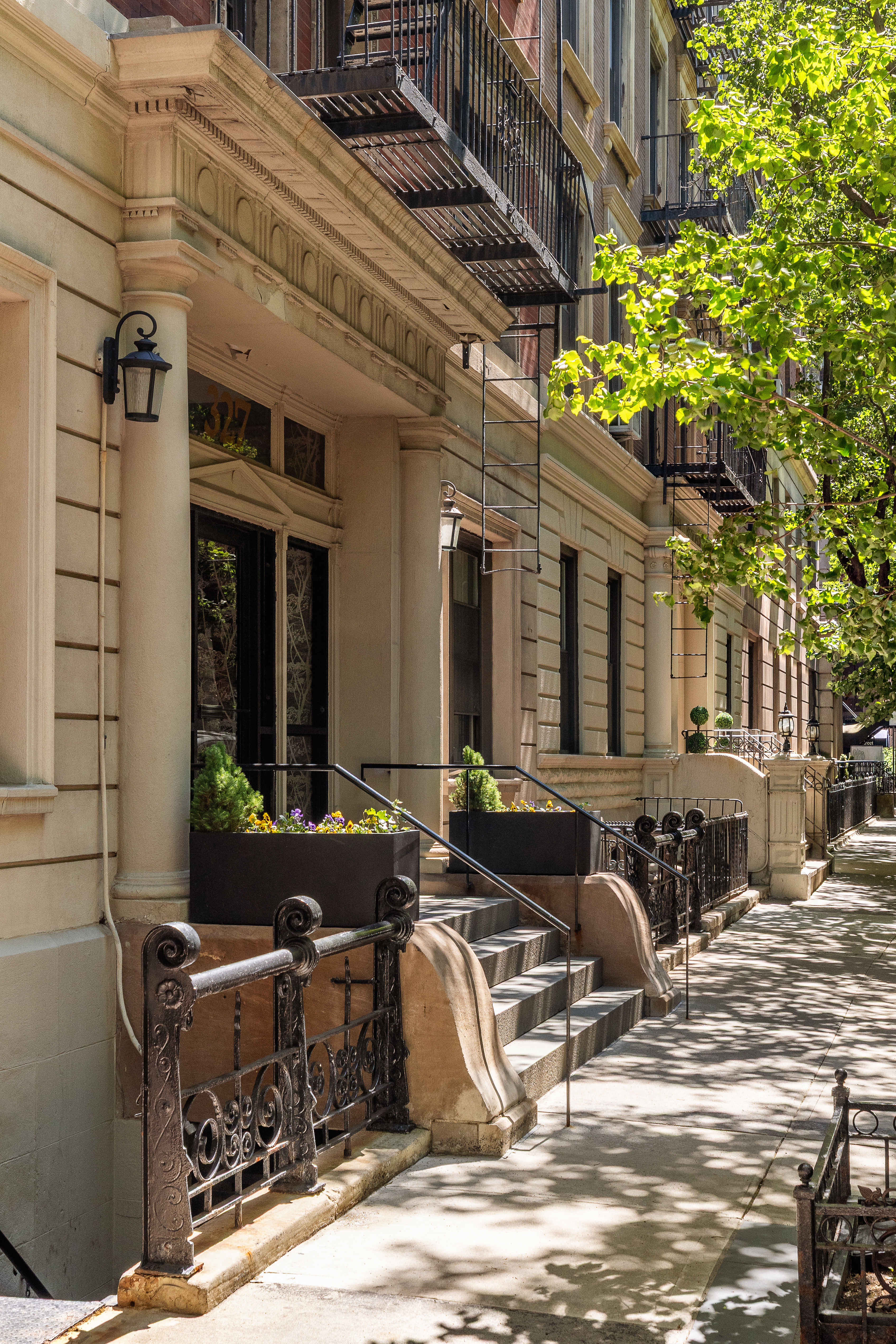 327 West 83rd Street, Unit 6B Manhattan, NY 10024 - Photo 11 of 13 a front view of a house with outdoor seating