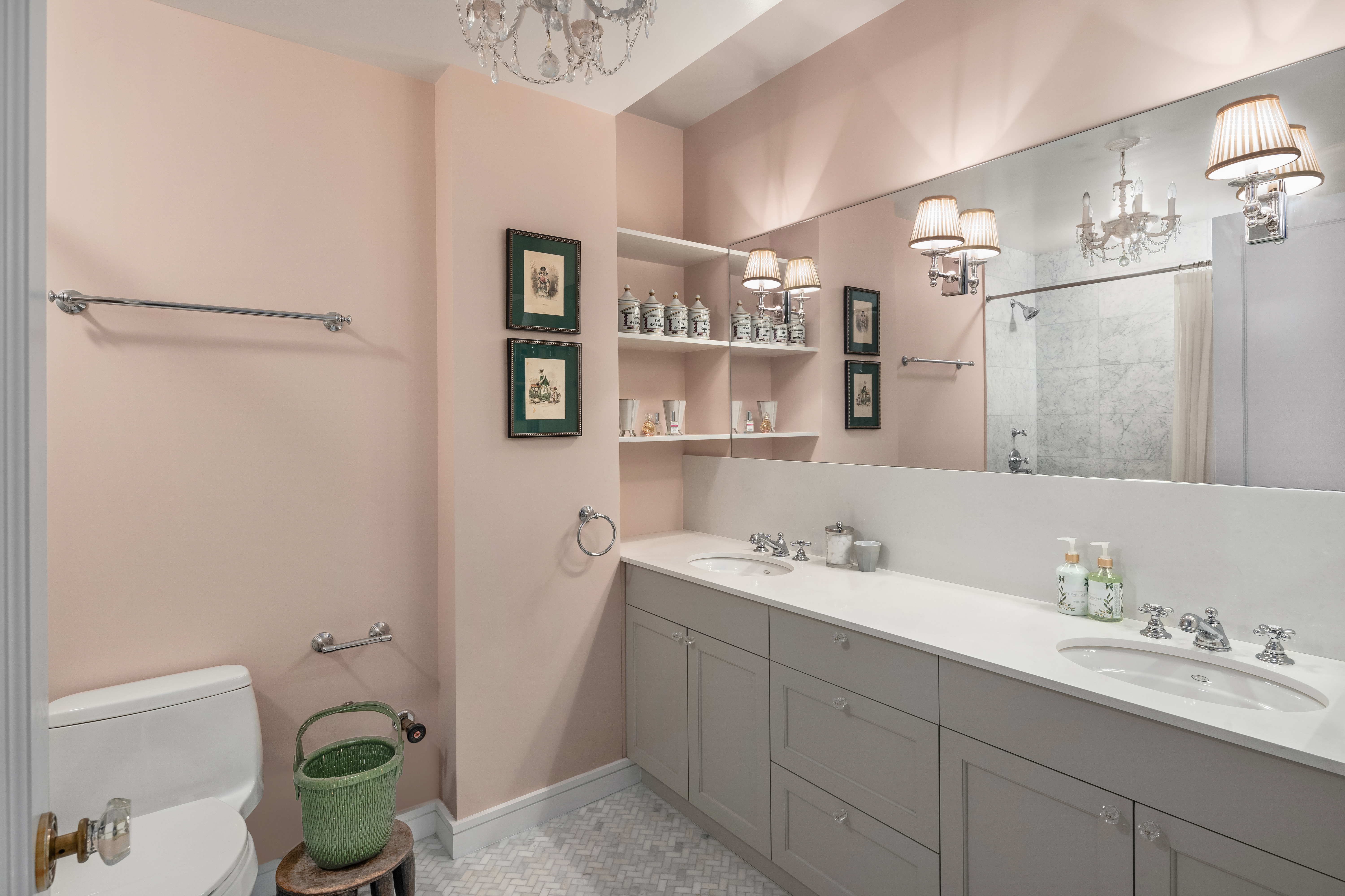 24 5th Avenue, Unit 801/802 Manhattan, NY 10011 - Photo 5 of 7 a bathroom with a double vanity sink and a mirror