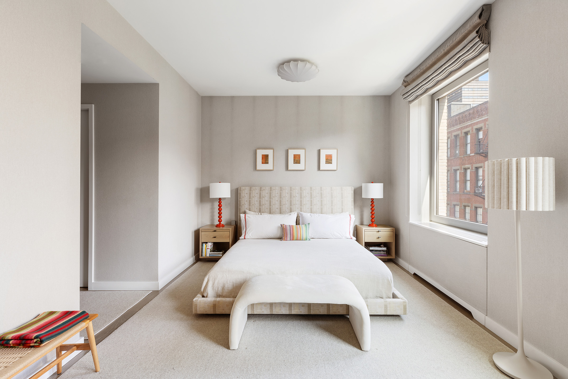 116 University Place, Unit 5 Manhattan, NY 10003 - Photo 9 of 19 a bedroom with a bed and a window