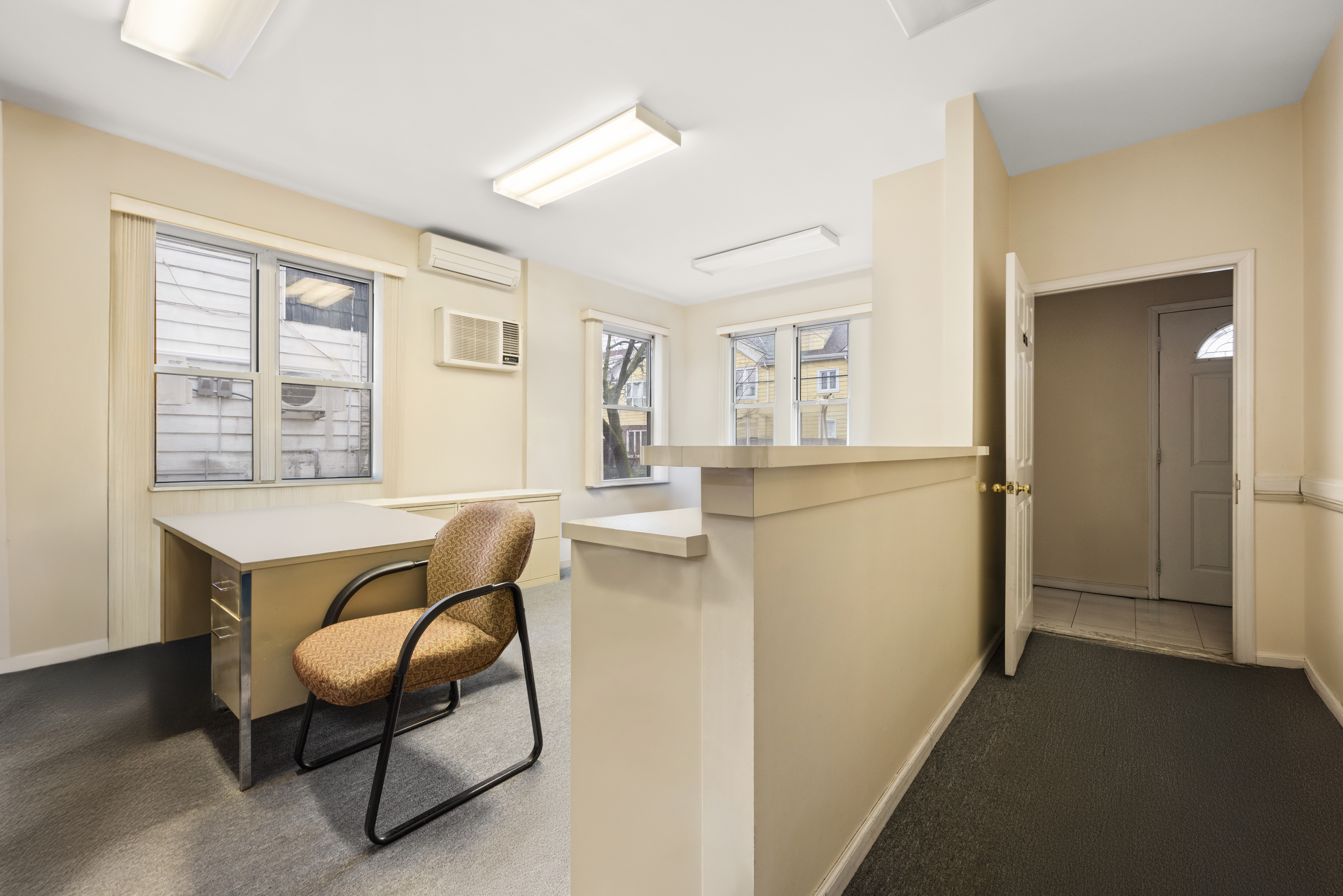 1635 West 12th Street Brooklyn, NY 11223 - Photo 11 of 21 a view of a livingroom with furniture and windows