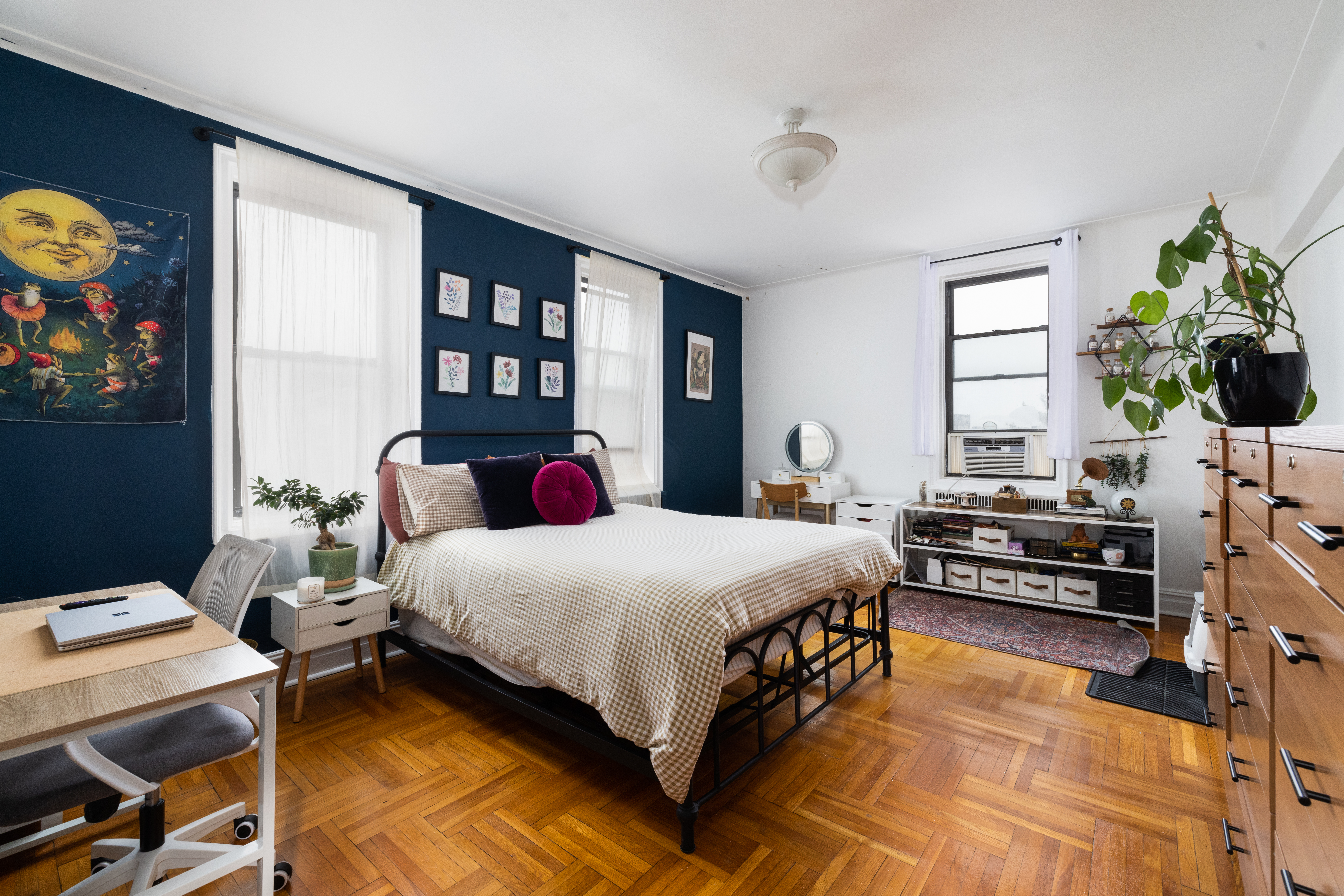 1680 Ocean Avenue, Unit 6D Brooklyn, NY 11230 - Photo 4 of 9 a bedroom with a bed and a flat screen tv