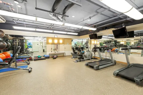 a view of a room with gym equipment
