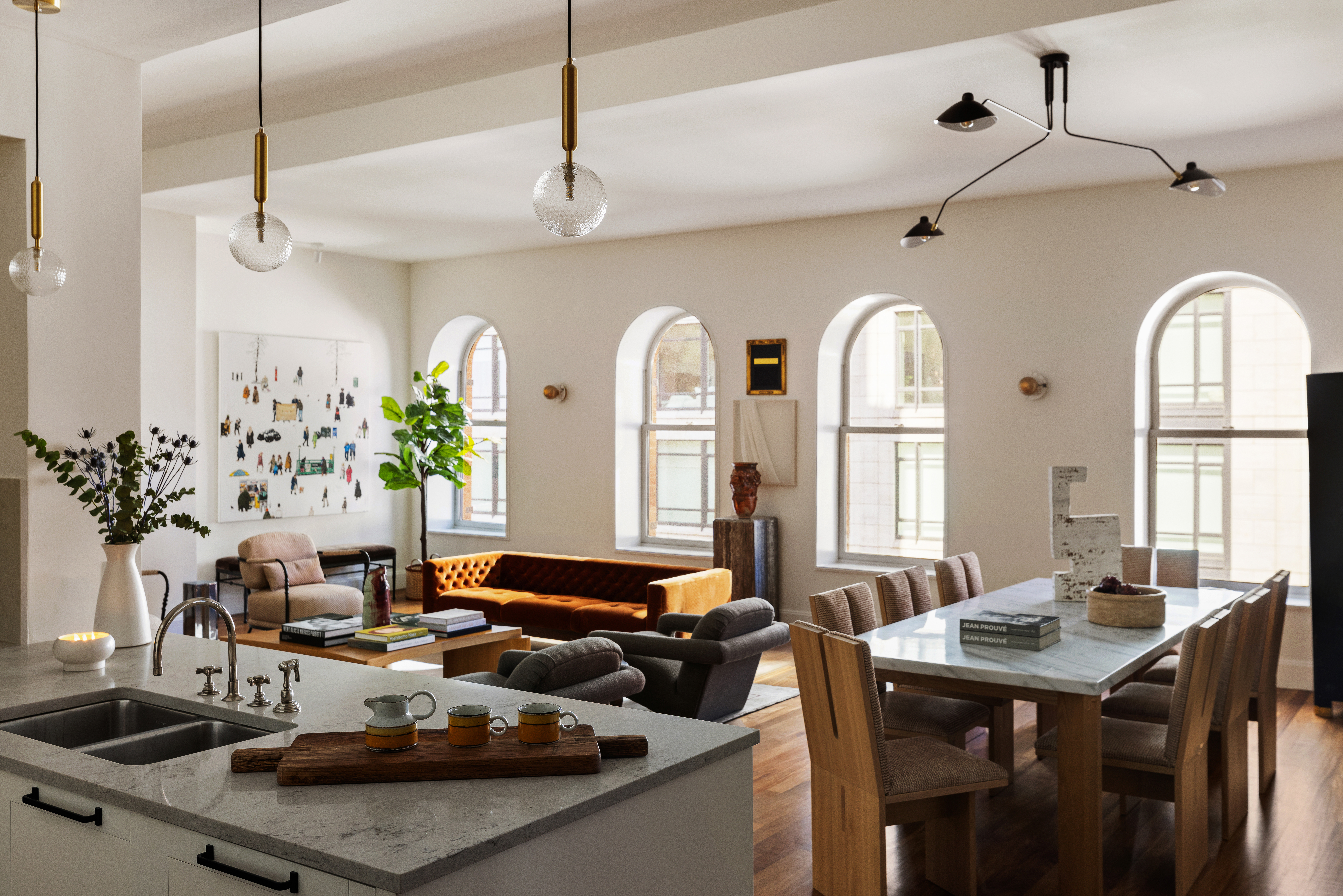 92 Laight Street, Unit 5E Manhattan, NY 10013 - Photo 10 of 26 a living room with furniture and flowers