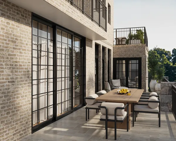 a view of a patio with a table and chairs