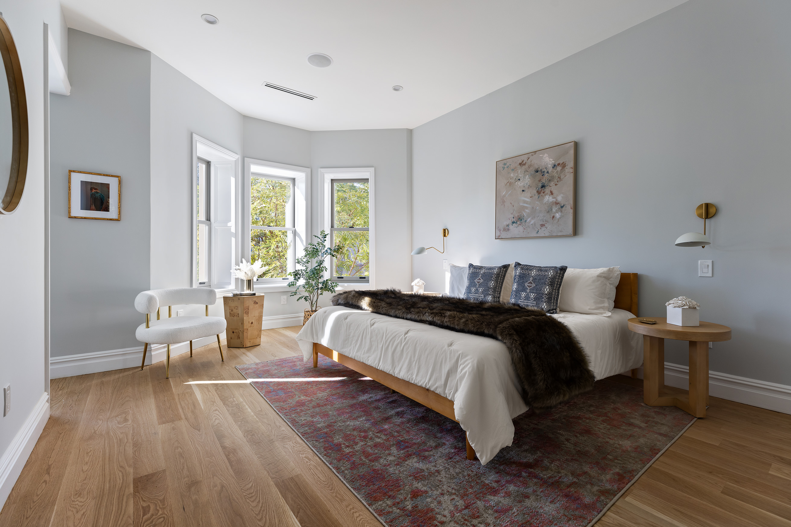 1433 Dean Street Brooklyn, NY 11213 - Photo 9 of 18 a spacious bedroom with a bed and a large window