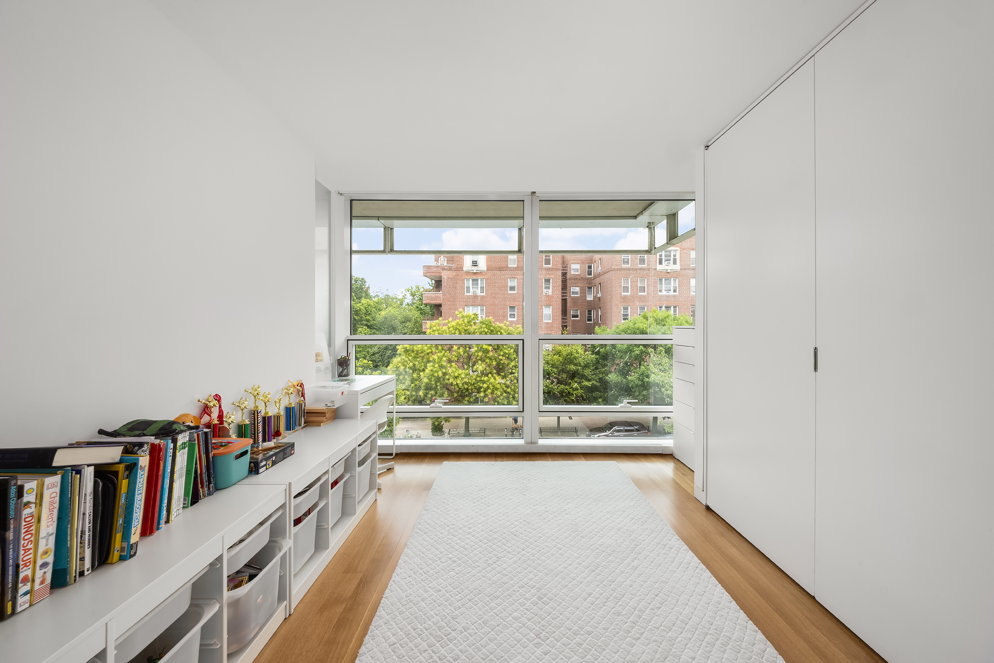 1 Grand Army Plaza, Unit 3C Brooklyn, NY 11238 - Photo 15 of 23 a hallway with a large window