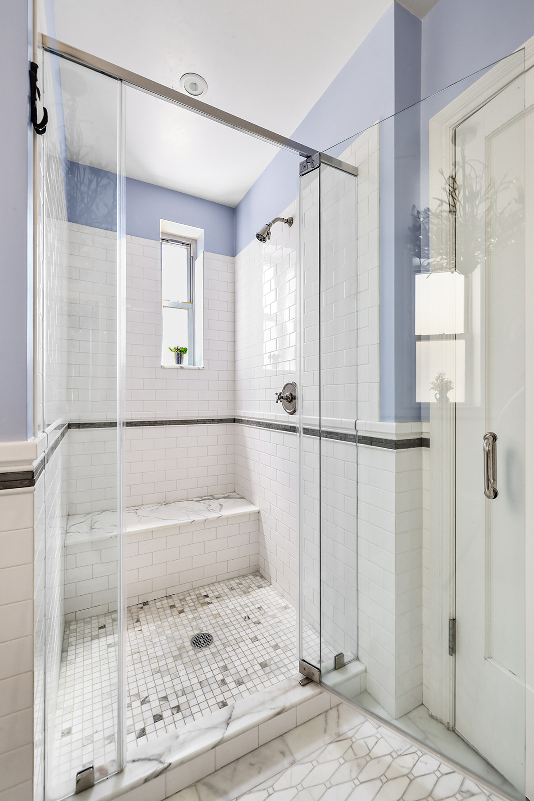 610 West 110th Street, Unit 4D Manhattan, NY 10025 - Photo 6 of 12 a bathroom with a bathtub and a shower